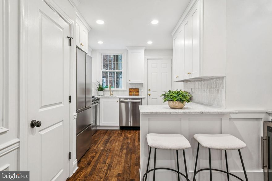 Welcome to this stunning home located in the popular Point Breeze neighborhood. Boasting three bedrooms and one and a half bathrooms, this residence offers a perfect blend of modern luxury and timeless charm. Step inside and be greeted by an open and airy floor plan, flooded with natural light that accentuates the high-end finishes throughout. The spacious living area is ideal for entertaining guests or simply relaxing with your loved ones. Gleaming hardwood floors, recessed lighting, and large windows create an inviting ambiance that is sure to impress. The gourmet kitchen is a chef's dream, featuring top-of-the-line appliances, sleek marble countertops and ample storage space. Whether you're hosting a dinner party or preparing a casual meal, this kitchen is equipped to handle it all. The adjacent dining area provides a seamless flow, making it easy to enjoy meals with family and friends.  Don't miss the opportunity to make this gem your own.