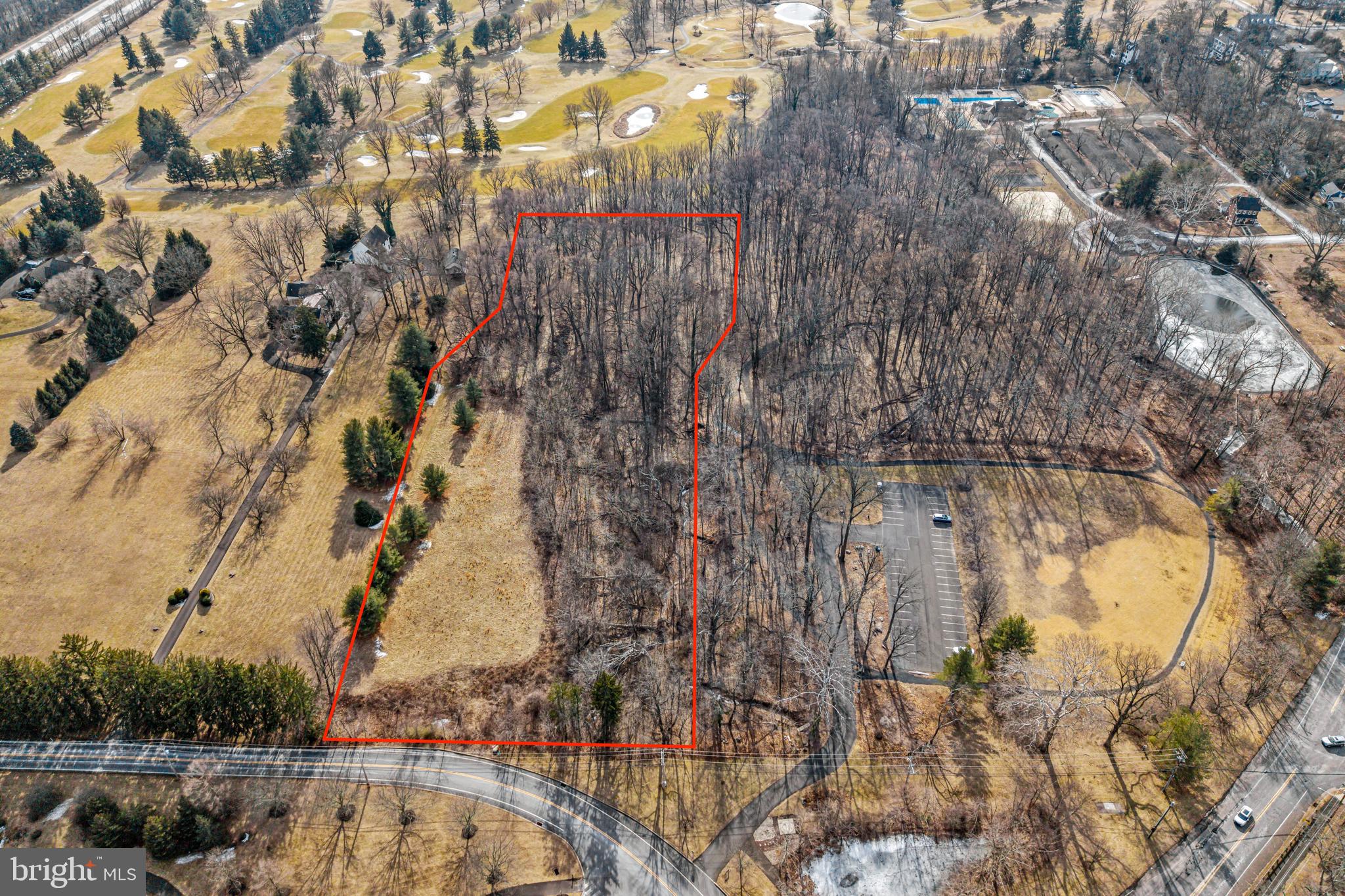 Prime 5-Acre Lot backing to Doylestown Country Club is waiting for its new owner to build a magnificent estate home or an investor/builder to subdivide. Discover this rare opportunity to own in the heart of Doylestown, perfectly positioned along the 3rd fairway of the prestigious Doylestown Country Club. This exceptional parcel offers a unique blend of privacy and serenity, all within minutes of Doylestown Borough's charming shops, restaurants, and cultural attractions. This expansive property provides endless possibilities with the beauty of mature trees, a creek flowing through and the unparalleled setting of a premier Bucks County location. Opportunities like this are rare—don’t miss your chance to own this one of a kind properties along the Doylestown Country Club golf course. Schedule your tour today.