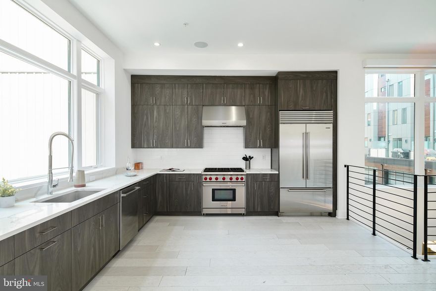 Discover this exceptional corner townhome offering a ton of living space including expansive decks with an attached 2-car garage and a 6-stop residential elevator providing direct access to the roof deck. Perfectly situated in the heart of Center City’s Old City/Society Hill neighborhood, this stunning residence combines luxurious design with urban convenience. Inside, you’ll find 4 spacious bedrooms, a dedicated home office, theater room, versatile flex space, 3 full bathrooms, and 2 half baths. Oversized windows flood the home with natural light, and the fully finished basement is ideal for a media room or personal gym. Just steps from Philadelphia’s vibrant waterfront, you’ll enjoy front-row access to the multi-million dollar Penn’s Landing Park expansion—set to redefine city living with green space, recreation, and community connection. Walk to theaters, fine dining, and cultural landmarks, all while enjoying immediate access to I-95 for easy travel. Live in the center of it all—luxury, space, and location, all in one of Philadelphia’s most desirable neighborhoods. Taxes and square footage to be verified by the buyer. There is a separate water fee of $87.72/month.