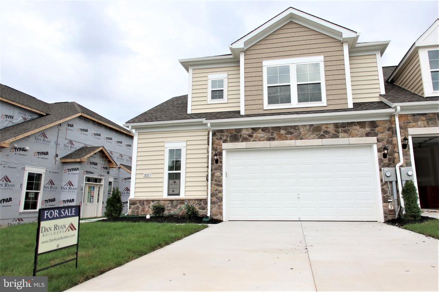 Gorgeous light filled end unit villa with desirable loft area. 3 oversized beds and 2 full baths and 1 half bath. An abundance of windows with open concept layout at its best. 1st floor owner's suite with huge en-suite and walk-in closet. Gourmet kitchen layout with stainless steel appliances puts the icing on the cake for this new build ready for November move-in!