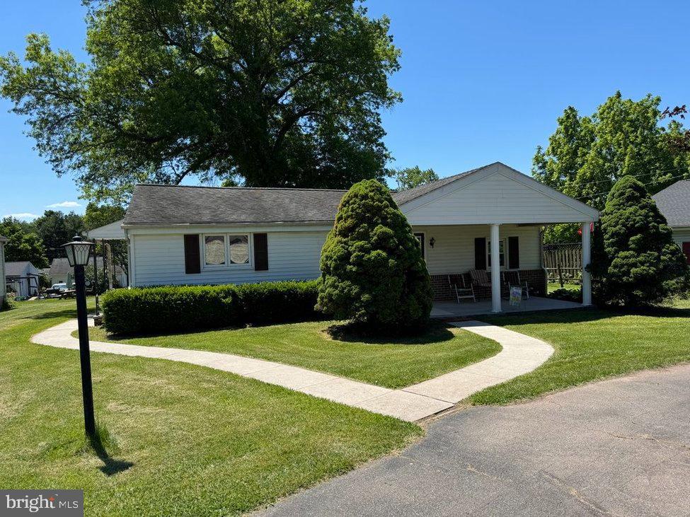 Welcome to this well-maintained 2-bedroom, 1-bath rancher, perfectly situated just steps from the elementary school and Brookside Park. Sitting on a gorgeous double lot, this home offers plenty of outdoor space to enjoy, along with a paved driveway and parking for up to 6 vehicles. Enjoy the convenience of all one-level living, complete with hardwood floors and a move-in ready interior that’s just waiting for your personal touch. The updated exterior gives great curb appeal, while the interior provides a cozy, functional layout that’s easy to make your own.All appliances are included, making your move-in even easier. Located right on the edge of town, you’ll love the balance of peaceful living with quick access to local amenities. Whether you’re starting out, downsizing, or looking for a comfortable home in a prime location, this rancher is a must-see!