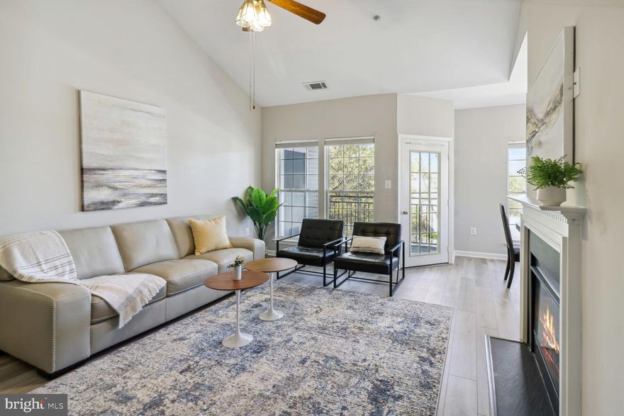 Welcome to this charming and spacious condo located in the desirable Random Hills Condominium community! This move-in ready unit features 2 bedrooms, 2 bathrooms, and almost 1,300 square feet. 

As you enter this penthouse corner unit, you'll find an open-concept living and dining area with large windows that allow for plenty of natural light. The living area leads to a private balcony that overlooks a peaceful courtyard, providing a perfect spot to relax and unwind.

The kitchen is well-equipped with ample cabinet space for storage. The primary bedroom boasts a large walk-in closet and an updated en suite bathroom with a beautiful walk in shower. The second bedroom is equally spacious and features a large closet and access to a modern full bathroom.

This condo also includes brand new flooring throughout the unit, a full-size washer and dryer in-unit, and two assigned surface parking spaces, as well as a guest parking permit. The Random Hills Condominium community offers fantastic amenities, including many green areas, outdoor pool, and a playground.

Located in the heart of Fairfax, this home is just minutes from shopping, dining, entertainment, and major commuter routes, making it a convenient choice for anyone looking for a great location. Don't miss out on the opportunity to own this beautiful home in a prime location!