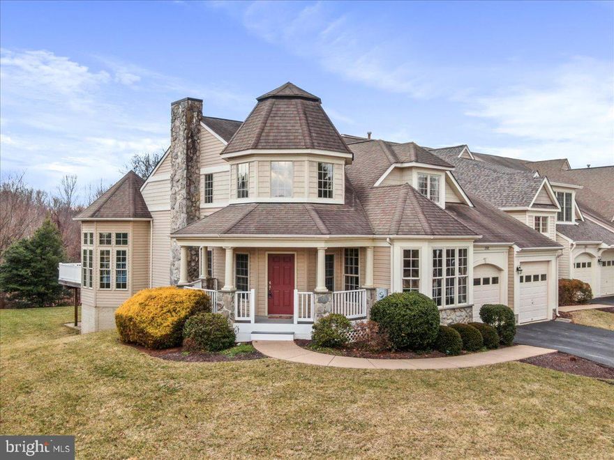 Welcome to this stunning end unit townhome nestled in a sought after resort style community, where comfort, elegance, and everyday convenience come together in perfect harmony.  Offered for the first time by the original owners, this home has been lovingly and meticulously maintained. With almost 5,500 square feet of finished living space, this feels more like an estate home than a townhouse. Step inside to a dramatic two story foyer that flows seamlessly into a breathtaking two story living room, highlighted by a beautiful marble mantel gas fireplace, gleaming hardwood floors and abundant natural light. The open, airy design creates an immediate sense of refinement and sophistication. The updated kitchen is a chef’s dream, featuring stainless steel appliances, custom cabinetry, granite countertops and a stylish ceramic tile backsplash. Just beyond, the dining room opens to a huge composite deck, offering peaceful views of the private backyard framed by mature trees, ideal for entertaining or relaxing in your own serene retreat. A bright sunroom/conservatory adds even more flexible living space, while the main-floor office with built-in cabinetry provides the perfect work-from-home setup. The luxurious main floor primary suite offers convenience and privacy, complete with dual walk-in closets and a spa inspired bathroom featuring a soaking tub and a separate walk-in shower. Upstairs, you’ll find two spacious bedrooms and a full bath. The true showpiece of the upper level is the open loft overlooking the main living area, which creates a dramatic architectural feature and versatile bonus space. The fully finished walk-out basement, completed in 2018, further expands your living space. Enjoy a large family room with a gas fireplace and wet bar or kitchen rough-in for future plans, a spacious bedroom with oversized windows, a finished flex room perfect for a playroom or hobby space, a full bathroom, and ample storage. Step outside to a beautiful, expansive patio which complements the upper deck for seamless indoor/outdoor living.  Additional highlights include a two car garage, generous storage throughout, and a prime location close to everything you need.  This exceptional home truly offers the best of style, space, and setting — a rare opportunity you won’t want to miss.