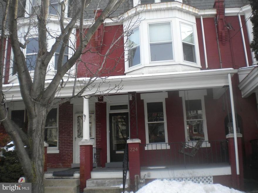 Charming 3-story town house located within the approved parameters for LGH home buyers program.  This spacious home has been updated throughout while still maintaining its original character.  You'll fall in love with the spacious updated kitchen with tons of counter space and SS appliances.  Four large bedrooms and a second floor bonus room can be used as an office, nursery or storage. Includes AHS One Year Home Warranty!