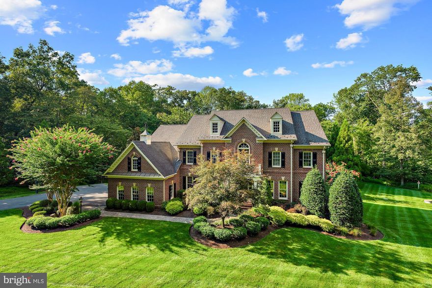 Welcome to 15616 Jillians Forest Way, considered by many to be the most desirable street in Western Fairfax County. New in June 2022 - fresh paint throughout the entire interior & new LVP flooring in the lower level! Premier location - just 10 minutes to Dulles International Airport, a short drive to major commuter routes (Routes 28, 29, 50 and 66), local golf and country clubs that you can purchase memberships to, wineries & breweries, Cox Farms and its seasonal offerings, shopping, cafes and restaurants, fitness centers, schools, campgrounds, historical Bull Run Battlefield with horse and walking trails, and so much more. Quietly situated on 5.78 wooded acres, this impressive, all-brick, Renaissance built residence presents the unique opportunity to live within the privacy of the sought-after Cardinal Forest Estates community while also being just minutes away from all of your modern-day conveniences and amenities. After meandering your way down the tree-lined drive, soak in the many outstanding features this 7,781 sq ft estate home has to offer including the bright, open and airy floorplan; three-bay, three-car side load garage; soaring two story ceilings in the Foyer with its sweeping staircase and in the Family Room with its wall of windows overlooking the beautiful backyard retreat; three fireplaces to include a floor to ceiling masonry, wood burning fireplace in the Family Room; handsome hardwood floors throughout the main level; built-in indoor and outdoor speaker system throughout; Custom cherry wood built-ins in the Home Office and Family Room; Gourmet Kitchen with gas cooking, sleek stainless steel appliances, oversized entertaining island, granite counters, and Butler’s Pantry connecting to the formal Dining Room; Main level Home Office; Primary Bedroom with coffered ceilings, two incredibly generous walk in closets, a cozy Sitting Room with a gas fireplace, and a luxurious En Suite Bath with dual vanities, marble countertops, oversized soaking tub, and a separate shower; Granite countertops in all additional Bathrooms; Finished walkout lower level hosts a Rec Room with Kitchenette, a Theatre Room with built in surround sound where you can watch the latest films or the week’s hottest games, an area for a home Gym, and a Bedroom with full Bath for your guest’s to enjoy; the expansive outdoor living spaces seamlessly flow from the Kitchen and offer the perfect areas to find retreat or to entertaining family and friends with the gorgeous and expansive Ipe Brazilian wood deck that walks down to the flagstone terrace built in stone fireplace and Pergula with hot-tub. This stunning and impeccably maintained property is ready to welcome you home!