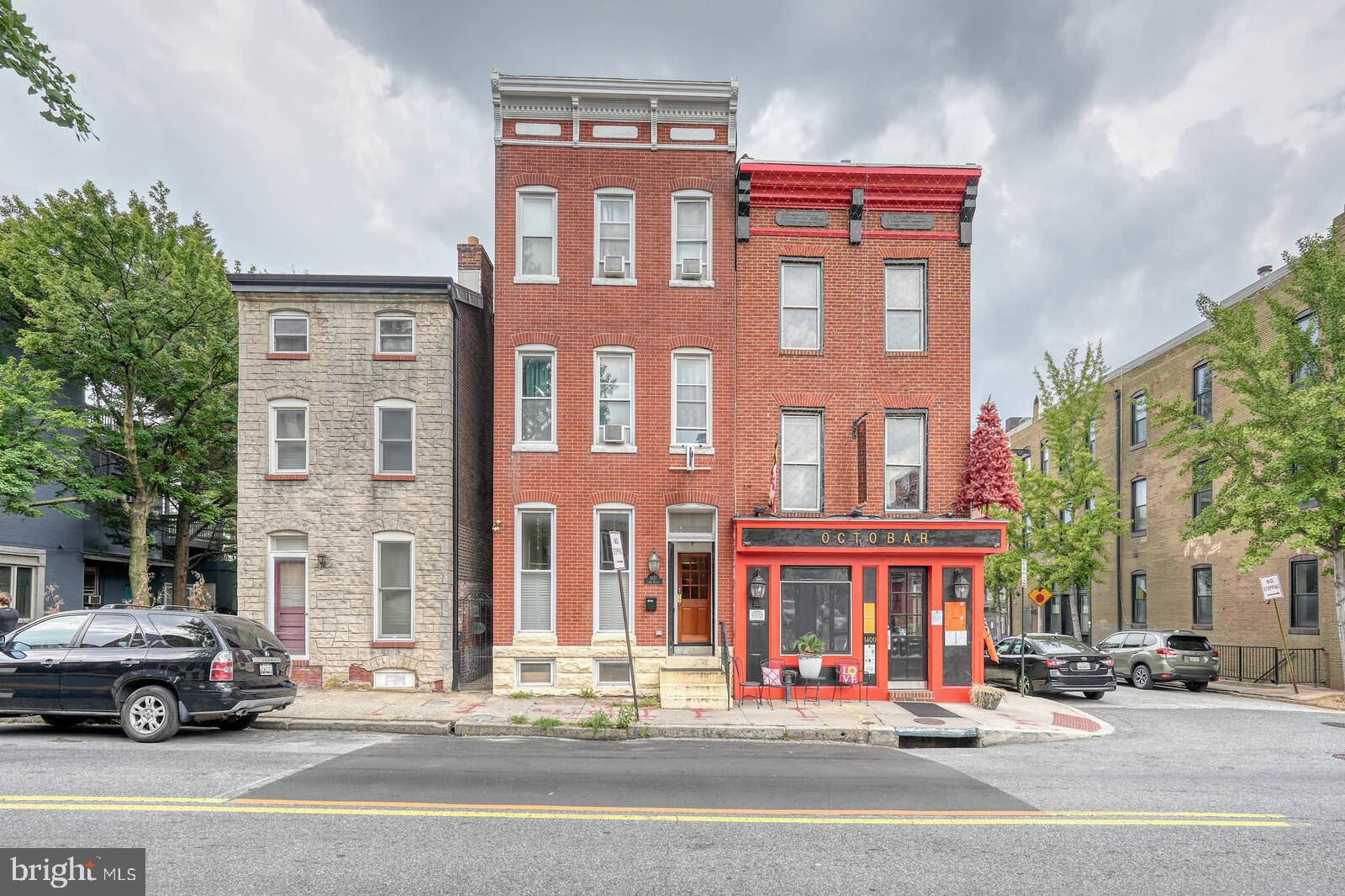 Absolutely Gorgeous! Attached interior unit townhouse in a great location. Very close to many area attractions in the heart of Federal Hill. The home features many unique characteristics that truly make this Federal Hill House a great buy. Glass front vestibule leading to the living room featuring pocket doors, carved wood fireplace mantel, hardwood flooring throughout, and many unique features and characteristics of the home. Ready for immediate occupancy, 5 spacious bedrooms, 4.5 bathrooms, and each level has a bathroom. Spacious Kitchen with plenty of cabinets. Formal dining area. Custom closets, dual staircases front and rear, leading to the basement level. Upper Level 2 has an entire ensuite bedroom leading to a rooftop deck, allowing a beautiful view of the City Skyline. The lower-level basement is partially finished with a bedroom and another full bathroom. Easy access to the lower-level laundry room. Fenced yard. Rear patio for private outdoor moments to enjoy your favorite drink of choice on favorable weather-permitting days. Close to many restaurants, shops, commuter routes, parks, and recreation. Also close to several highways, such as I-95, 295, and other interstates. Home is fully available and ready to be viewed!