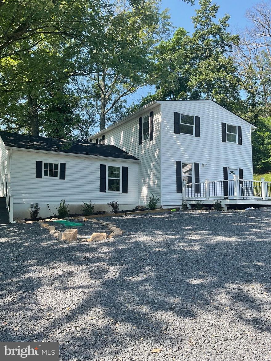 Welcome to 7464 Paw Paw Rd. SIX BEDROOMS FOUR FULL BATHS. 3 bedrooms, 2 baths upstairs. 3 bedrooms 2 baths downstairs. Perfect for multigenerational use or rental. This home has undergone a full interior and partial exterior renovation. All high quality appliances and fixtures. 45 minutes to Winchester, 45 minutes to Berkeley Springs. Convenient location on a main road that is always first to be plowed. 5 minutes into the cute little town of Paw Paw and Potomac River for recreation. Enjoy the best of both worlds. Out in the country, but accessible. Nice Mountain Views. Great condo alternative. Seller offering 5k towards closing costs.