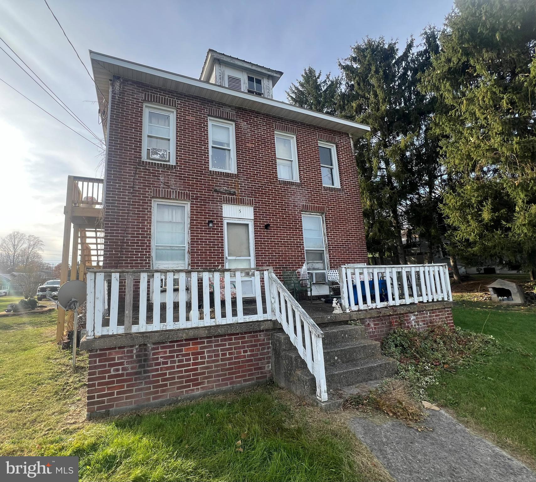 This charming brick duplex is located within the town limits of Hancock, MD, offering two spacious rental units. The main floor features a three-bedroom, one-bathroom rental, while the upstairs unit also offers three bedrooms and one bathroom. Recent updates include a new stairwell providing access to the second-floor unit and a newer metal roof. The property boasts a large driveway with ample parking space to accommodate both tenants. Situated close to everything Hancock has to offer, the home is just moments away from Main Street shops, the C&O Canal, the Western Maryland Rail Trail, the Potomac River, and a boat launch. Additionally, it offers easy access to US 522, I-70, and I-68, making travel to surrounding areas a breeze.