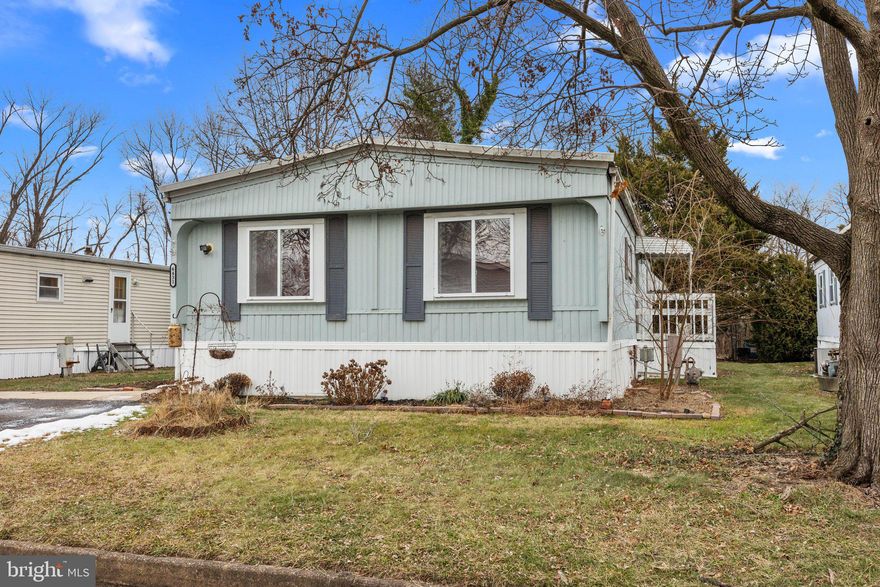 BACK ON THE MARKET because buyer wasn't able to obtain park approval.  
Introducing 6431 Finley Dr: A charming double-wide residence nestled within the esteemed Pennsbury School District, hard to find a home like this available for under $100,000. This meticulously maintained home boasts a recent interior refresh, including the removal and reinforcement of original flooring with elegant bamboo flooring gracing the living and dining areas. The spacious dining room features built-in cabinetry, while the generously sized primary bedroom enjoys the privacy of an en-suite bathroom. Enjoy picturesque views of the adjacent creek throughout most of the year. Community pool memberships are available through the local park.