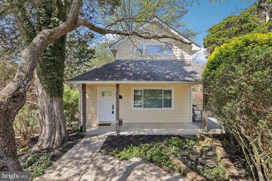 This updated detached home on a huge lot, featuring ample parking and a large two-story garage, is a rare find!  Located on an incredible private lot and bordered by a stream, immerse yourself in a rural feel while enjoying a suburban location and amenities.   This sun-filled home's features include an updated kitchen with stainless steel appliances & granite counters.  There are recessed lights throughout the home, skylights, custom closets, newer HVAC, and a full size washer and dryer  just off the bedroom.  On the exterior, there is a circular driveway, covered carport parking, and a massive two-story, two-car garage.  The garage offers space for cars, a workshop and storage (over 900sf), and a second level above could be an remote office.  Outdoor entertaining spaces abound - a large gas firepit on a hardscaped patio, walking pathways, a back deck, and plenty of quiet spaces under the trees.  Front of home features professional landscaping, and a deck off the kitchen overlooks the vast backyard.  Conveniently located close to Shops & Dining.  Come and see this unique and special property!