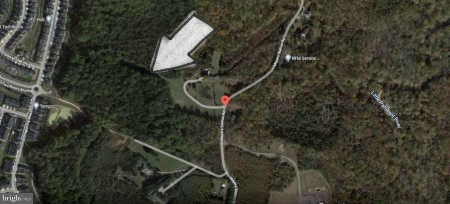 Just under 10 acres that borders up to Two Rivers in Odenton.  Existing home is abandon with a well and septic located on the property.  Seller makes no warranties or guarantees to any condition.  The property is conveying "AS IS" with numerous items that will not be removed.  Buyer is to accept property with all included.

Key access is required to gain access to gate and road.  Seller and Listing Broker is to assume no responsibility when touring the property.  A Hold Harmless Agreement is in the disclosures and is required before access will be approved.  The access road is very overgrown and could scratch your vehicle should you choose to drive back to clearing and house.