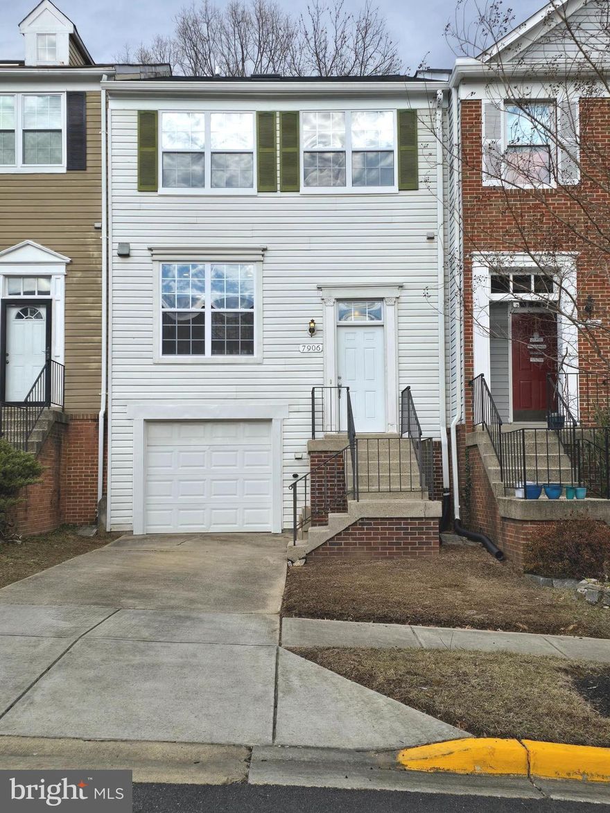 Welcome to this spacious 3-bedroom, 2.5-bathroom interior townhome that perfectly blends comfort and convenience.  As you enter, you're greeted by gleaming hardwood floors that flow seamlessly throughout dining and kitchen areas as well as the staircase and upper landing, creating an inviting and open atmosphere.  Featuring two wood-burning fireplaces, this home provides a cozy ambiance for family gatherings or quiet evenings in.  For all of you nostalgic individuals, imagine movie nights or big game events with the convenience of a projector setup (projector not included)—turn your living room into a home theater for the ultimate viewing experience.  The large living area is perfect for relaxation, while the well-appointed kitchen offers plenty of space for cooking and entertaining.  The stunning walkout basement adds both character and functionality. Perfect for entertaining or relaxation, the basement offers a warm and inviting atmosphere with its own wood-burning fireplace.  As a bonus, the Seller is providing an extra 30-gallon electric water heater to easily convert from 30 gallons to 60 gallons.  The buyer is responsible for connecting the extra water heater for service.   Setup has been done.
The primary bedroom boasts its own private bath with a skylight, French doors, and double closets to provide ample space, offering a peaceful retreat. Two additional bedrooms and a full bath complete the 2nd upper level, ideal for family or guests.
Enjoy outdoor living with your own private deck—perfect for morning coffee or evening meals. The home also includes a single-car garage, providing secure parking and additional storage.  The driveway accommodates two additional vehicles.
Located in a desirable neighborhood with easy access to local amenities, this townhome is the perfect place to call home. The Greenbelt Community Center, just a couple of miles away, provides access to a state-of-the-art aquatic and fitness center offering everything from swimming pools to fitness equipment for your health and wellness.  The community center features a vibrant youth center—an ideal space for kids and teens to connect, participate in activities, and make lifelong memories. Whether you are looking to stay active, relax by the pool, or keep the younger ones entertained, this neighborhood has it all.
The neighborhood is conveniently located near schools, restaurants, shopping centers, bus routes, 295 parkway, 495 beltway and the Greenbelt Metro Station.  Do not miss the opportunity to make it yours!  Greenbrook Village awaits!