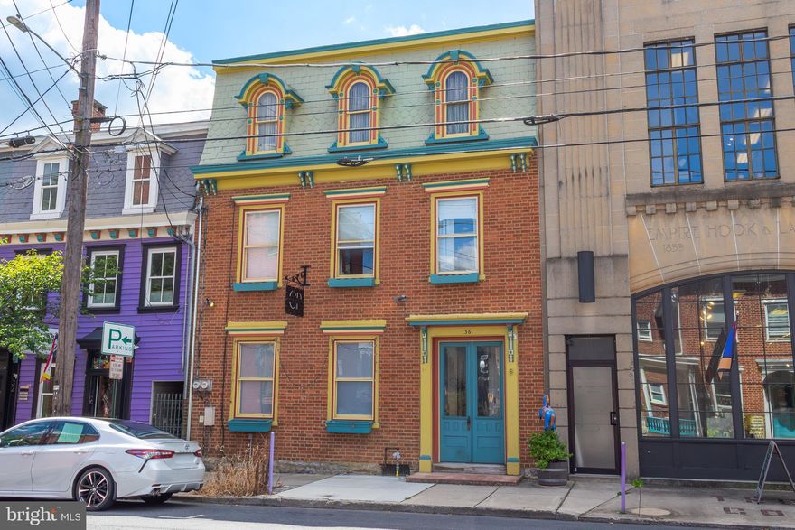 Beautiful downtown commercial building along Carlisle's first block of West Pomfret Street.  Located centrally among local businesses, retailers, boutiques, galleries, and eateries!  A short walk to downtown amenities - and plenty of foot traffic. Building includes 1,517 SF of charming first floor retail space with hardwood floors, kitchen, and laundry service. Second floor features a spacious, renovated 3 BR / 1 Bath apartment with laundry. apartment has separately metered electricity / natural gas. Paver patio and rear courtyard for outdoor activities. Detached block garage building (28' x 40' = 1,140 SF) with alley access from the rear. Garage has electricity and a 10x12 overhead door. Several stackable off-street parking spaces in the rear. First floor is currently rented at $1,600/month for the retail space; second floor apartment is currently rented  at $1,500 a month. The owner is currently using the garage, proposed rent  $500 a month.