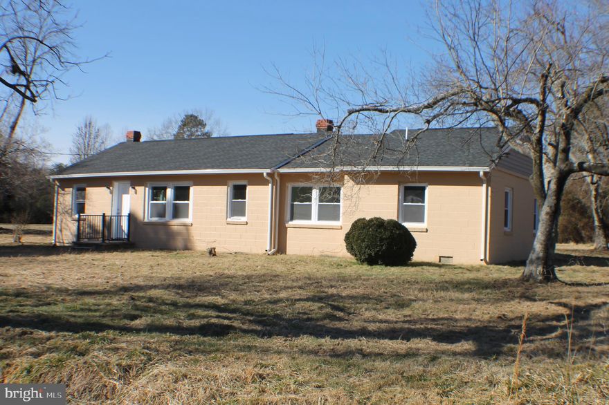 Come see this beautiful newly remodeled rambler. All new interior to include new Hardwood floors throughout, as well as new kitchen Cabinets. All new double hung windows. New bathrooms. Brand new heat pump system. New gutters and downspouts . Very tastefully done inside . Downlighting throughout. Very close to shopping, and the gorgeous little township of Bowling Green. , Va.  Won't be here long...Country living at it best.    1.344 Acres surounding this home.