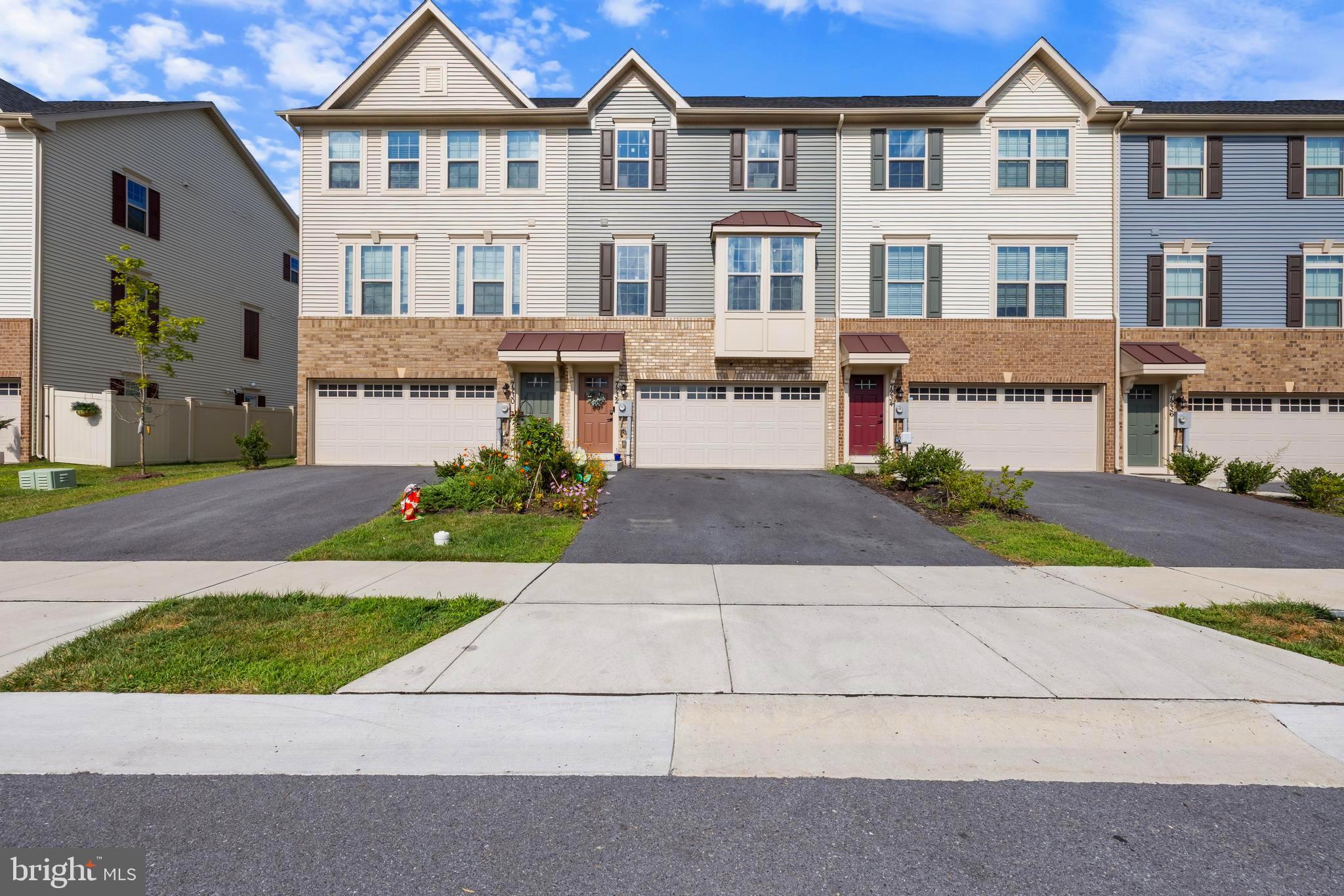 This gorgeous 3-bedroom, 2 full and 2 half bath home, just 2 years old, offers modern living at its finest. The entry level features a versatile rec room with half bath, access to your 2-car garage, and a walk-out to the backyard. Additionally, the basement includes multiple storage areas. On the main level, you’ll find a spacious living room, a stunning gourmet kitchen with a large center island, dining area, guest half bath, and walkout to your private rear deck with a new gazebo. A unique feature of this home is the added coat closet on the main floor—something not found in any of the other townhomes in the community. Upstairs, enjoy a luxurious primary suite with a beautifully upgraded full bath and walk-in closet, plus two additional bedrooms, a full hall bath, and the convenience of an upper-level laundry room. Located in the sought-after Lake Linganore community, residents enjoy access to pools, lakes with beach access, trails, tennis courts, and so much more. (Rooms can be repainted to suit your needs upon approval from owners)