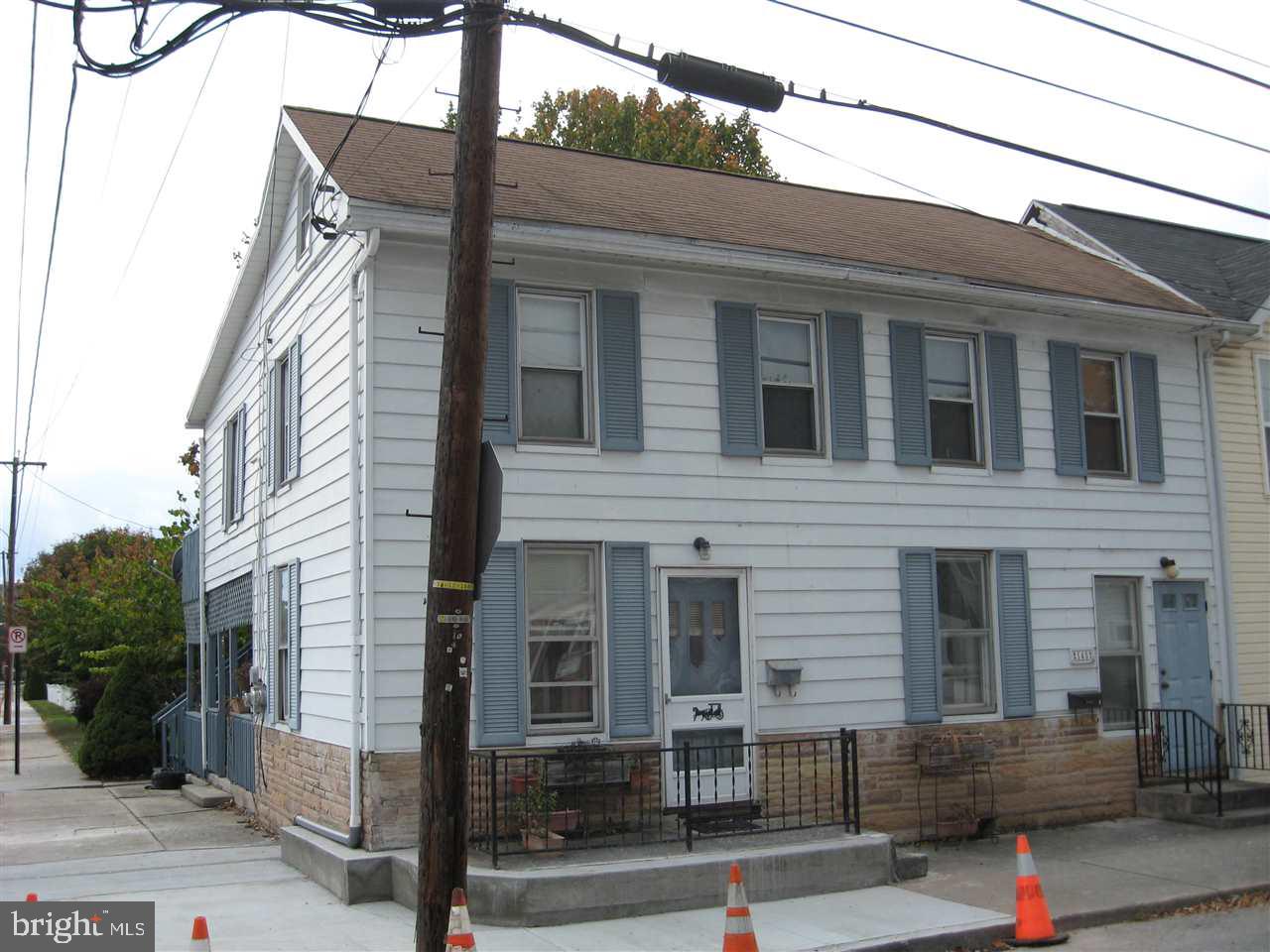 Super convenient location close to grocery, medical, pharmacies, Rec Park/dog park, hospital & battlefield. Up & down 2 unit w/2 BR's each. Live in one & rent the other to help pay the mortgage. Utilities separated & both units have CAC & laundry hook-ups. Very nice size yard w/flowering trees & off-street parking. R2 zoning allows certain business uses including B&B & office by special exception approval.