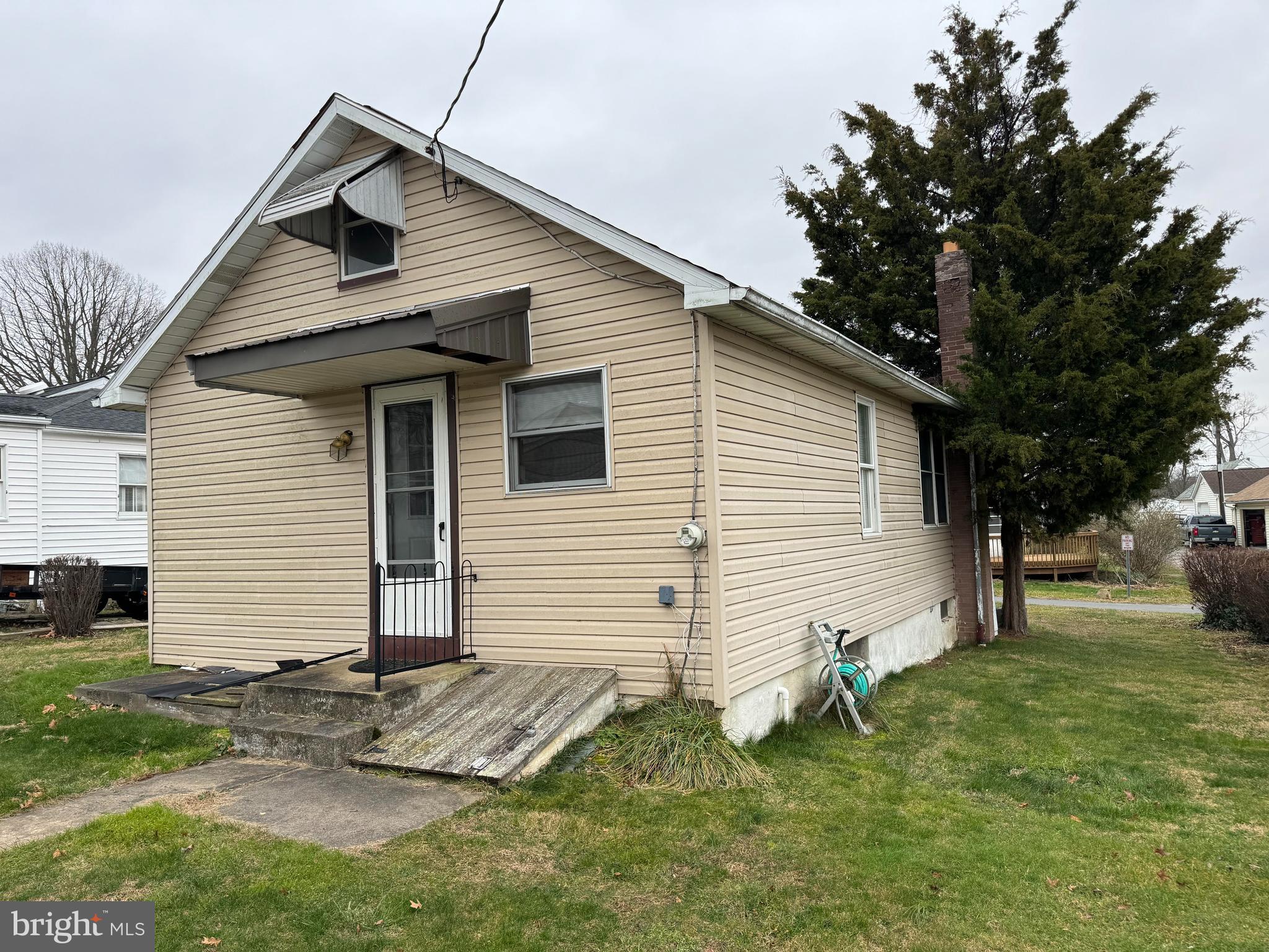 Cottage with water view in Crystal Beach Manor. 2 bed, 1 bath. Unfinished basement. Shed. Square footage appears to be more than assessed amount.