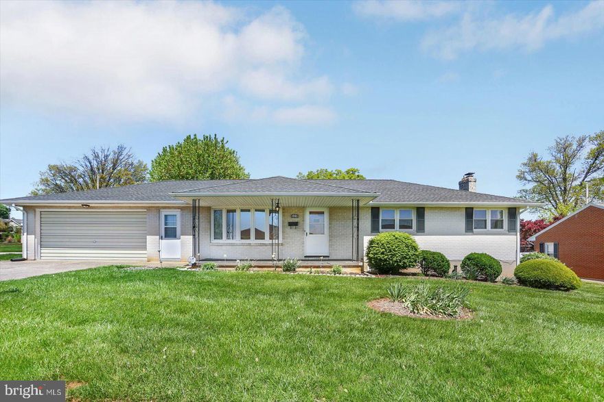 Welcome to 1995 Worth Street, a meticulously maintained  all brick Rancher in West York school district with an oversized 2 car garage!  This home features 3 bedrooms, 1.5 bathrooms, a welcoming living room with a large bay window and hardwood floors that can be found under the wall to wall carpeting.  Off the living room is the formal dining area with French doors that lead to a covered back porch and an eat-in kitchen with built-in appliances and custom cabinetry.  Just down the hall are 3 good-sized bedrooms with large closets and more hardwood flooring under the wall to wall carpeting, as well as a charming bathroom with original tile work.  The lower level has a massive area for entertaining with a gas fireplace and an attached half bathroom and a separate storage room with a laundry area.  Finally when looking to relax outdoors take some time to enjoy the large level corner lot from the covered back porch.  With recent upgrades including a newer water heater, roof and windows this home is move in ready and a must see to appreciate all it has to offer!