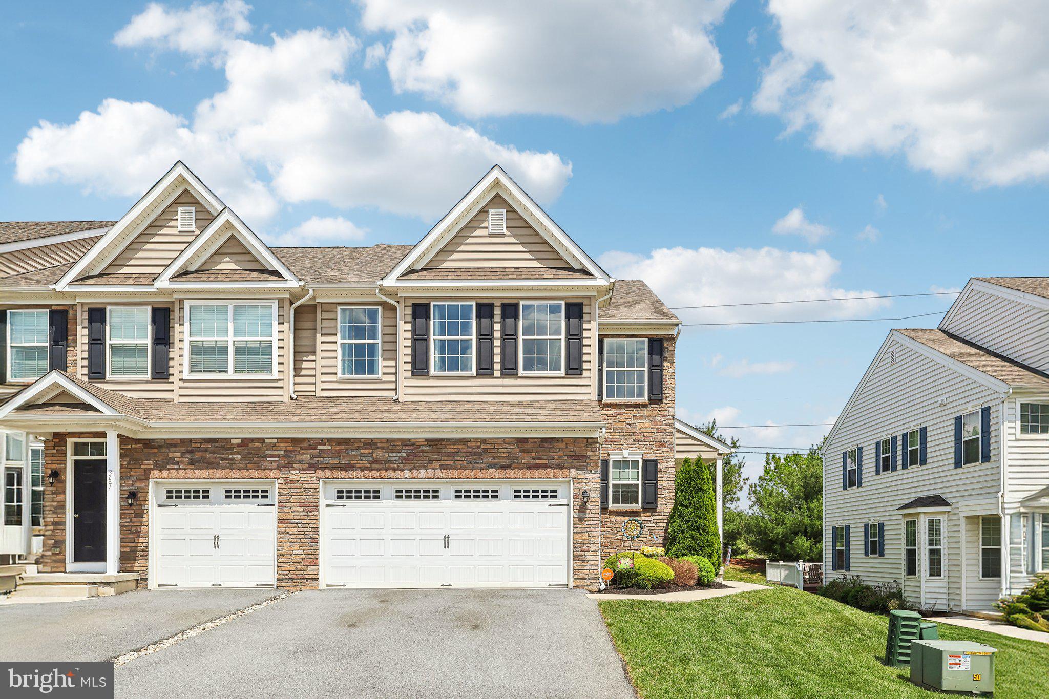 Immaculate End-Unit Townhome – Like New & Fully Upgraded!
This former new-construction gem is beautifully maintained, thoughtfully upgraded, and absolutely move-in ready. Nestled in a quiet, well-kept community, it boasts a spacious driveway and an attached 2-car garage for everyday convenience.
Step inside to a sun-filled main level with gorgeous hardwood flooring, oversized windows, and a cozy fireplace that creates the perfect gathering space. The open-concept layout flows effortlessly into a gourmet kitchen featuring expansive granite countertops, stainless steel appliances, a gas stove, and generous prep and storage space—ideal for cooking and entertaining.
Endless upgrades are found throughout the home, including: custom stair railings, stylish shower finishes, ADA-compliant toilets, storm doors, extra recessed lighting, and upgraded plumbing fixtures—every detail was carefully chosen for comfort and quality.
The main level also includes a stylish powder room and a full-sized washer/dryer for everyday ease. Retreat to the main-level primary suite, offering a spa-like en-suite bathroom with a double vanity and modern finishes.
Step out from the living room to your private concrete patio—perfect for summer BBQs, quiet mornings, or relaxing under the stars.
Upstairs, you’ll find two spacious bedrooms, including a second primary suite with its own en-suite bath, plus a bright and airy guest bedroom. All carpeted areas—including all bedrooms and the finished basement—feature upgraded carpet and padding for added luxury and comfort.
The finished lower level provides a large rec room, a second powder room, and endless possibilities for entertaining, gaming, or creating a home theater or gym.
This home delivers the perfect blend of modern style, premium upgrades, functional space, and unbeatable comfort.
Don’t miss out—schedule your private tour today!