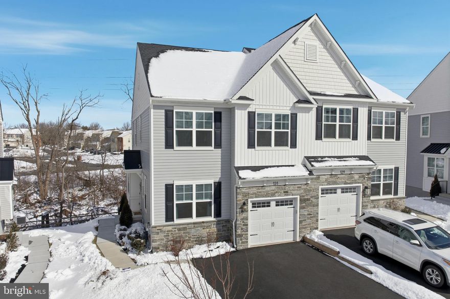 Better Than New Construction! This 3 year old fully upgraded twin home at  Highpointe at Salford community, offers a harmonious blend of luxury and comfort. The Colonial architectural style showcases timeless elegance, enhanced by premium vinyl siding and meticulous landscaping that invites you in. Step inside to discover a thoughtfully designed interior featuring an open floor plan that seamlessly connects the living and dining areas, with high ceilings and tons of natural light. There is a flex room on the first floor could be used as home office, guest bedroom, playroom or den. The gourmet kitchen is a chef's dream, boasting upgraded countertops, stainless steel appliances, and a spacious island perfect for entertaining. Enjoy cozy evenings by the gas fireplace, creating a warm ambiance throughout. Retreat to the master suite, complete with two large walk-in closets both outfitted by  Closets by Design. The en-suite  spa-like bathroom offers double sinks and a walk-in shower. Two additional bedrooms provide ample space for guests or a home office also with closets by design upgrade. The fully finished basement offers endless possibilities, with a walkout level that leads to serene outdoor spaces. Outside, the deck and patio provide an ideal setting for al fresco dining, while the property adjoins open space and backs to lush trees, ensuring privacy and tranquility. The community amenities, including bike trails and jogging paths, enhance the exclusive lifestyle this home offers. With an attached garage and energy-efficient features throughout, this residence is not just a home; it's a sanctuary designed for modern living. The home was modified from the builders plans as previous owner was a professional interior designer and was able to enhance the functionality and flow of the home during its construction.