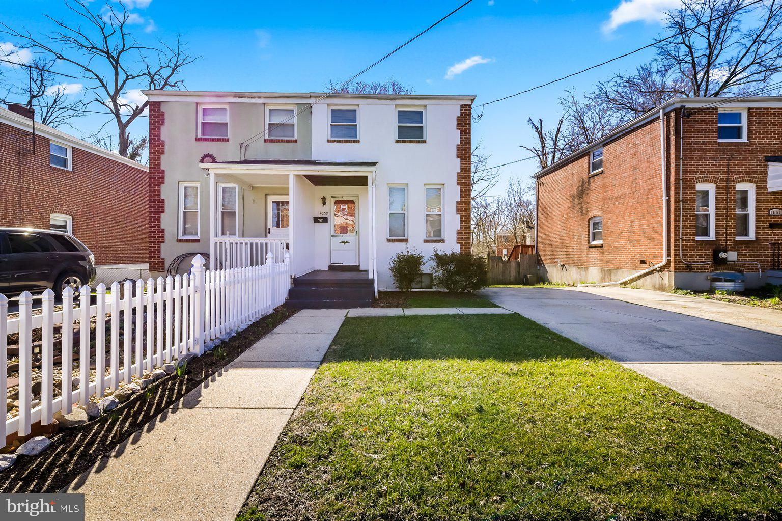 Price Reduced! The perfect starter home or a good investment opportunity, this classic semi-detached home well maintained home is ready for a new home owner. This light filled home offers the perfect mix & warmth of original charm with wood floors throughout, combined with modern amenities and updates that cater to today's lifestyle. The traditional floor plan of the main level includes a spacious living room, eat in kitchen with reverse osmosis water filtration system, main level laundry in sun room, and access to a generous sized deck and large yard. You’ll love the smart layout of the upper level that includes a spacious primary bedroom, full hallway bathroom with tub/shower combo, and second bedroom. The full height fully finished lower level includes a large room that could be a third bedroom, or family room, and full bath with standing shower and updated vanity, storage, utilties, and access to rear yard. Location can't be beat as it provides easy access to Towson, shopping, grocery stores, restaurants and more! Property sold AS-IS. Showings by appt only with 24 hours notice.