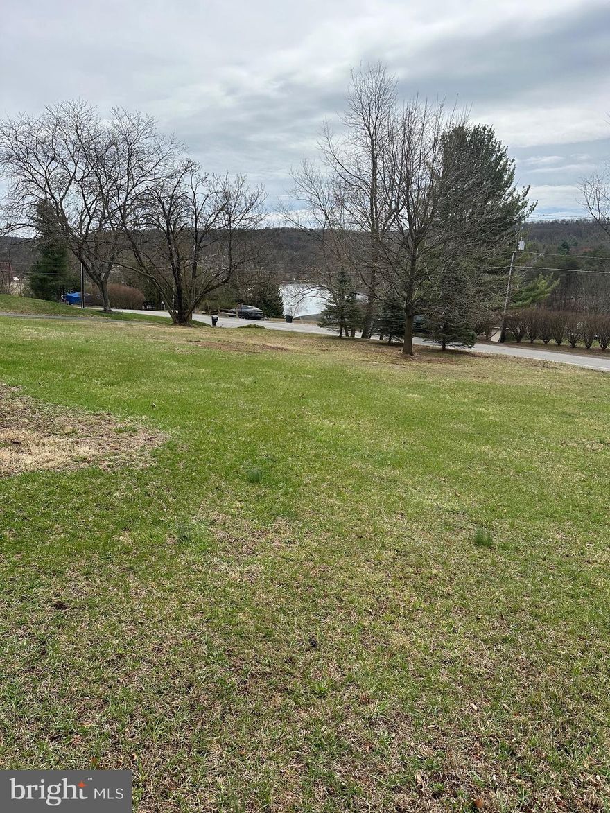 Build Your Dream Home with Breathtaking Lake Views! This 0.3-acre buildable lot in the peaceful community of Lake Wynonah offers the perfect opportunity to create your ideal lakeside retreat. Suitable Site Investigation/Perc Report available. Imagine waking up to stunning views of the lake every morning, all while enjoying the tranquility and affordability of this desirable location! 
Buildable Lot: Ready for your vision to come to life.
Lake Views: Enjoy the beauty of Lake Wynonah from your future home.
Peaceful Community: Experience the charm of Lake Wynonah.
Prime Location: Situated in the Schuylkill Haven School District. 
Invest in a property that will provide years of enjoyment; close to a new hospital, multiple grocery and convenience stores, restaurants, and more....
Don't miss out on this incredible opportunity! Contact us today to schedule a viewing and learn more about building your dream home on this stunning 0.3-acre lot with lake views.
Lake Wynonah is a gated, lakes Gold Star community, featuring 2 gorgeous, pristine, spring-fed freshwater lakes (Lake Wynonah is approximately 90 ft. deep and Fawn Lake 45 ft. deep at deepest areas). Amenities include: business office/gathering room/library, lodge w/dining and bar, social clubs, boating, fishing, wakeboarding, waterskiing, tubing, paddleboarding, tennis, pickleball, several parks/pavilion, basketball courts, horseshoe pits, 2 pools, beautiful docks, hiking, natural wildlife and marina. Groups and events include: Active Civic Association, Dances/Concerts, Book Group, Pinochle Group, Volunteer Programs, Fish & Boat Group. Located less than an hour from Allentown, Harrisburg, Hershey and Reading. Close to Philadelphia and surrounding suburbs. Beat the beach traffic, forget the Poconos and settle in at the lake. Lake Wynonah is "Life On Vacation"! Discover Lake Wynonah.
