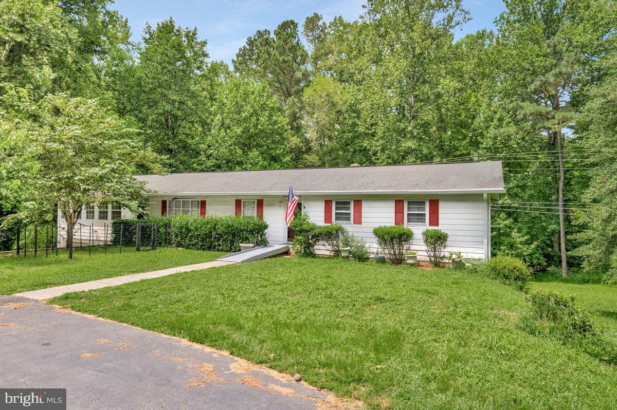 Experience the best of countryside charm at 25757 Jones Wharf Road. Situated on 4.7 acres, this 2,292 sqft residence offers 3 bedrooms and 2 bathrooms. It features an expansive sunroom, offering a bright and inviting space to enjoy year-round. Recent improvements in 2025 include a new heat pump with oil backup and some new kitchen appliances. The layout includes an attached garage, a separate laundry room for added convenience, as well as a partially upgraded bathroom. With an unfinished basement waiting for your personal touch, this property provides endless possibilities for customization. Schedule your visit today to envision the potential of this incredible home.