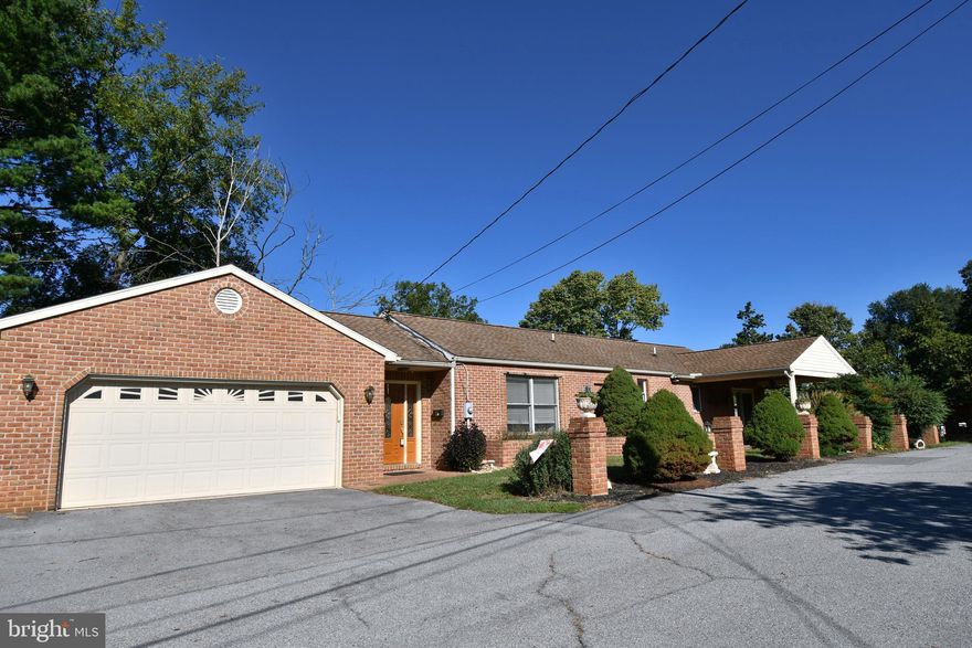 Come and enjoy the life of minimal home care and a great outdoor living space.  Did you ever want to downsize and not worry about having rooms in your home that you never use like a formal dining room and dedicated formal living room?  Well then this is the home for you! Welcome to 1021 Murdock Avenue. An all brick home at the end of cul-de-sac. This is not a thru street so there's no traffic to worry about.  This home boasts a generous attached 2 car garage and a beautifully renovated eat in kitchen with countertop seating and room for a 6 person table plus, you still have room to add a large TV over the gas fireplace in the kitchen and an oversized loveseat.  Never have to worry about cooking the meals and missing out on being with family or friends  in another room.  Down the hall you will find an updated full bathroom with a washer and dryer that convey. No more lugging your laundry up and downstairs because the 2 bedrooms are on this same level as well. The primary bedroom also has it's own full bathroom.  There is a generous size room between the bedrooms that you could use as a reading space, nursery or home office.  There is also 2 wonderful all brick patios - one in the front of the home that has a covered roof and one in the backyard off the garage - which is perfect for grilling!  Downstairs in the lower level of the home you will find the perfect getaway - its super cozy with another gas fireplace and makes the perfect family room or man/woman cave ! And the best part is it has  walk up stairs to the outside - so its super simple to get furniture in and out of the basement. Once you're outside you will have a privacy fence and a saltwater above ground pool and a NEW 2-story pool house!  This pool house is super cute inside and has electricity.  The upstairs makes a great storage area or finish it a bit more with your touches and its a great hang out space for the family.  Lastly, there is an amazing HUGE side fenced in YARD. This is a fabulous space to plant a massive garden, play soccer or any sport or let the family camp out under the stars and there is extra paved parking right in front of the side yard. ALL THIS and you are literally minutes from great restaurants and entertainment.  RUN, don't walk and come scoop up this home before the holidays !