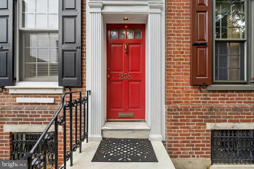 A rare opportunity to live steps from Washington Square Park, 238 S 7th Street combines the perfect mix of historic Philadelphia with modern amenities and finishes throughout this 4 bedroom 2.5 bathroom property. Enter through the front door and the updated finishes of the home will be immediately apparent with the beautiful black and white basket-weave marble tile and convenient coat closet and custom-made hat/coat pegs. Through the vestibule you will find a cozy living room with a gas fireplace finished with a brick surround and gracious wood mantle with built-in bookshelves. A wet bar—perfect for entertaining and extra storage—has a beautiful arched opening looking over the living room. A spacious dining room large enough for hosting holidays and family dinners leads seamlessly to the sun-filled chef’s kitchen boasting a Sub-Zero refrigerator, Dacor 6 burner range, custom-milled cabinetry and a striking tiled backsplash. Glass doors lead out to your secluded garden oasis with plenty of room for grilling, eating and lounging. The second floor features a powder room with radiant heat under tiled floors, a bedroom/family room with a fireplace in the front of the home and a serene main bedroom with a very large master bathroom complete with double marble vanity and over-sized glass shower. The third floor features two more oversized bedrooms with large closets and an expansive renovated bathroom with a glass shower enclosure and radiant-heated floors. The bonus 4th floor space can be used as an office, family room, workout space, guest room and more and has the potential for a deck to be added. The basement houses the modern mechanicals, including a tankless hot water heater, new LG laundry, extensive shelving for storage and a large walk-in cedar closet. Steps to restaurants, theaters, shops and the finest of Philadelphia!