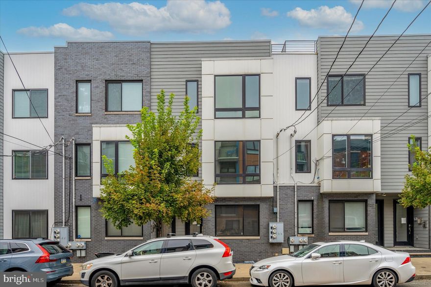 A unique opportunity to own this gorgeous 3bd, 3ba home with ROOF DECK and PARKING. Sitting at the prime location right off Girard Ave, this almost new Olde Kensington home features a desirable open floor plan, with  hardwood floors throughout, large windows and tons of natural light! There is a nice sized bedroom and a full bath on the main level with spacious storage and closet. The second floor  features 2 spacious bedrooms with large closet spaces, one has its own full bath with double sink. There is another full bathroom in the hallway and a full size laundry. Upstairs is the stunning roof deck with great views to the city! Never worry about finding street parking, Park in your own space directly behind your building and walk into your back door! If you are a dog owner there is a conveniently located dog park in the rear!  Great walkability to all the retail, restaurants, and nightlife Northern Liberties and Fishtown has to offer. Schedule your showing now!