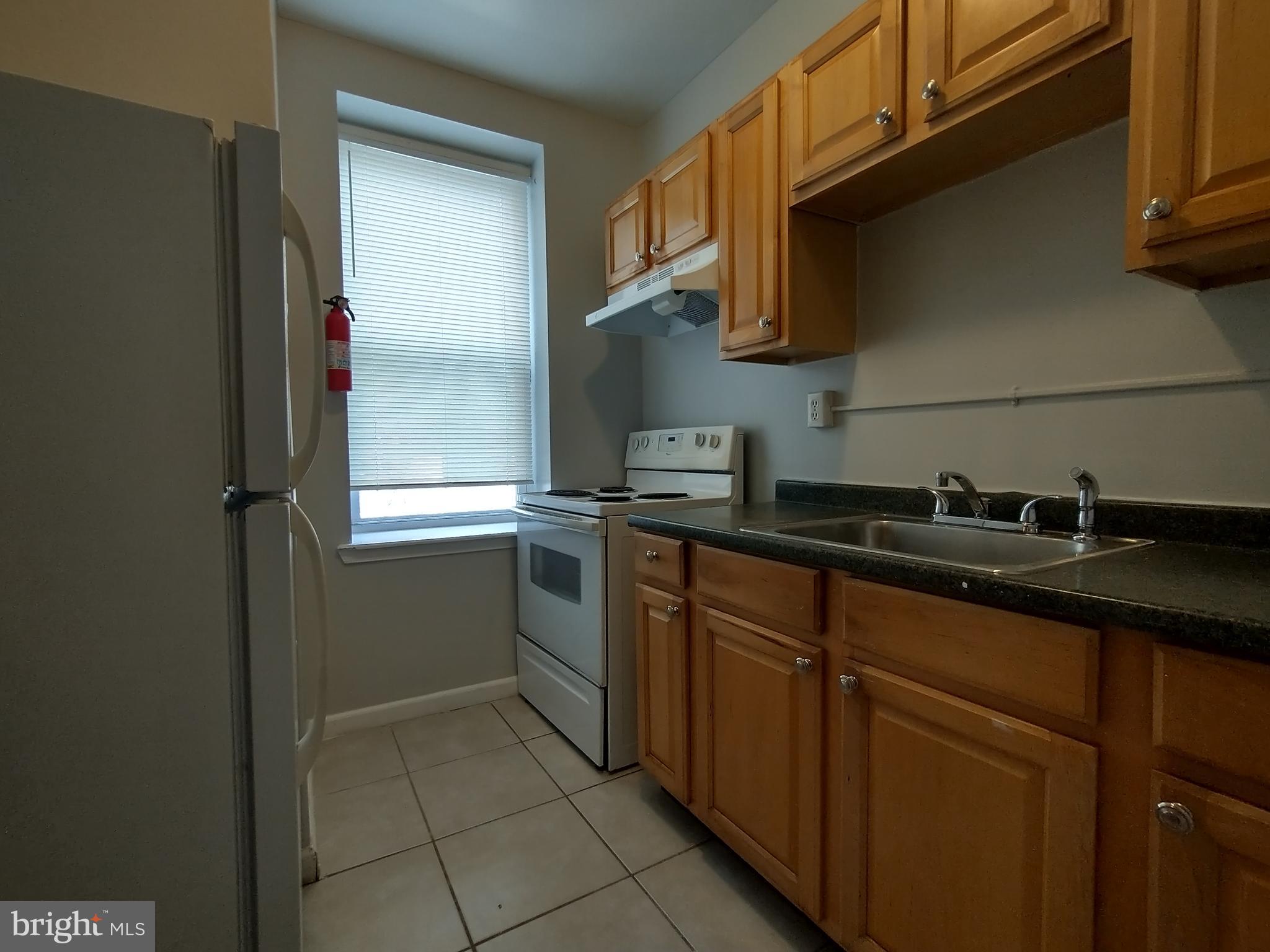 *One Month Free Rent* - 2-bedroom, 1-bath apartment. Perfectly suited for roommates, a small family, or anyone who wants a dedicated home office, this thoughtfully designed home features double coat closets, plush wall-to-wall carpeting, and oversized windows that bring in tons of natural light with relaxing courtyard views. The kitchen is equipped with a gas stove and full-sized fridge—ideal for everything from morning coffee to weekend meal prep. 
Enjoy central A/C to stay cool year-round, and elevator access makes coming and going a breeze. 
Secure keyless entry into the building. Amazon Hub for package deliveries! 
Utilities not included in rent. There is a flat monthly utility fee for water.  Residents must establish their own BGE account.
Hampton Court Apartments is a conveniently located mid-rise building in the Bolton Hill area of Midtown Baltimore City. Our professionally managed community offers a perfect mix of historic charm, affordability, and proximity to a variety of city amenities.
It's within walking distance of MICA, University of Baltimore, University of Maryland Medical Center, State Center, and Mount Vernon. You’ll enjoy hardwood floors, large windows, and high ceilings. Virtual tours are available. Students are welcome. Inquire today.
We are also close to the State Center Metro Subway stop, the Cultural Center Light Rail stop, Penn Station, and several bus stops.
Bus Routes: 53, 54, 73, 94, 154
CityLink Lines: Yellow, Lime, Pink