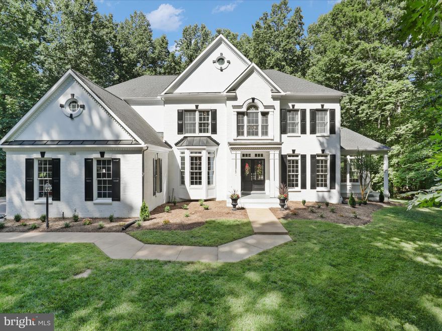 Private, Elegant and spacious!! That is what you get and more with this beautiful Colonial in Canterberry Forest! Sited on nearly 5 acres it has 5 bedrooms, 5.5 baths plus a 3 car garage and tons of recent updates. 
Home has been painted inside and out this year. One outside HVAC compressor and one interior furnace are brand new as of June 2024. The 2 new units control the main level and lower level.  Hot water heater is about 3 years old and the roof was replaced six years ago. All new carpeting and wood floors refinished as of June 2024. plus a brand new Chandelier graces the grand foyer. 
Large eat-in Kitchen updated with Jenn Air Double oven, cooktop and Refrigerator. Beautiful Kitchen island and tons of cabinets. Gracious formal dining room is right off the kitchen plus a gorgeous light and bright 2nd Sun room! You've got a Formal living room, powder room, main level office w/built in bookshelves, Sun room and large family room w/gas fireplace (logs replaced December 2023) on the main level too! Walk out to the great deck with tons of privacy. Deck redone in 2024.
Upper level has 4 large bedrooms -- the Primary Suite is AMAZING!! The main bedroom has a vaulted ceiling, It also has double closets and a sitting area that could be used as a nursery/TV Room/Office. Primary Bath is updated with Double sinks, Soaking tub, Large shower and private water closet. 
Two bedrooms share a Jack and Jill bath plus another large Full bath and bedroom on the upper level. Spacious Laundry Room is on the upper level. You've got 2 staircases to choose from in this home. One in the main foyer and one off the kitchen.
The Basement is like its a home of its own! It has 2 full baths, one bedroom and another room that could be used as a bedroom/den/office. There's also a kitchenette and dining room area. Walk out to the spacious and private fenced in back yard.  Did we mention the storage? This home is full of it.
Long driveway, perfect location right across from Burke Lake Park and all the shopping and commuter routes you could ever want plus the best schools! And would you believe it....NO HOA!!!
This House Beautiful is waiting just for you!! See it today before its too late.
Please remove shoes or use covers.