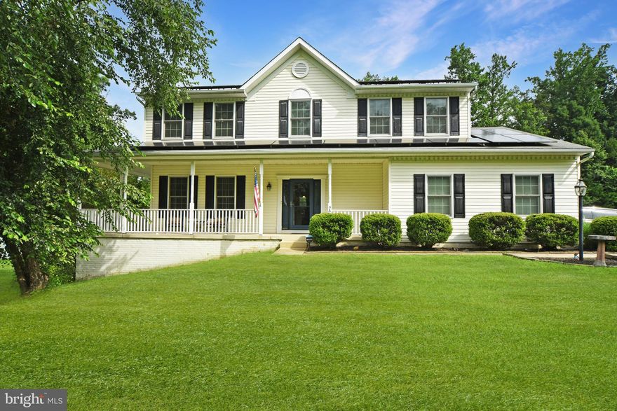 Colonial Home on 0.67 acres in The Woodlands community in Abingdon, MD.  Enter from the covered front porch into the foyer that opens to the living room and hallway to kitchen.  There is a step down family room off of the kitchen with a gas fireplace.  Decorative raised panel wainscot in the dining room.  The primary bedroom suite with private bathroom has a soaking tub and separate tile shower.  The basement is unfinished with a walk-up entrance to the rear brick patio.  Access the rear deck from the sliding glass doors in the kitchen.  Updates include replacement windows, newer doors, water heater, washer and dryer.  Solar panels were purchased by the Sellers in June, 2022 through Sustainable Energy Systems and are currently financed through GoodLeap.  Additional information regarding the Solar Panels is pending.  See MLS Documents for detailed brochure, community documents, and Seller disclosures.