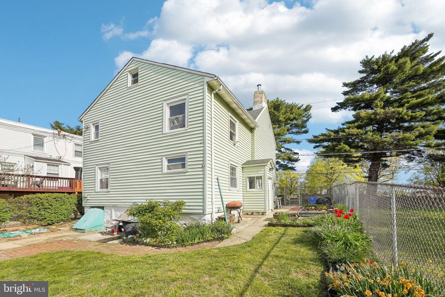 Welcome to this inviting single-family home with tons of classic charm throughout. Enter into a warm and welcoming foyer that opens into the cozy living room, where a decorative fireplace serves as the focal point. The generous formal dining room offers plenty of space for entertaining, and it leads directly into the functional kitchen. With ample cabinet and counter space, a newer refrigerator, and room for a table, this kitchen is ready for everyday living. A convenient mudroom just off the kitchen provides access to your private outdoor oasis. Out back, discover the true gem of this property: a partially fenced-in backyard that has been lovingly landscaped to create a serene escape. The grid garden boasts paths that provide full access to the multiple garden beds—perfect for the green thumb looking to grow flowers, vegetables, or both. Whether you're sipping coffee on a sunny morning or harvesting your summer bounty, this backyard is a dream come true for any garden enthusiast. Upstairs, you'll find three spacious bedrooms and a full hall bathroom, offering comfort and versatility for family, guests, or a home office setup. The third-floor attic provides ample storage and potential for future expansion.  Recent updates include a new furnace (2009), hot water heater (2022), dryer (2019), and a termite treatment completed in 2020 for peace of mind. This home offers charm and a rare outdoor retreat—don’t miss your chance to make it yours!