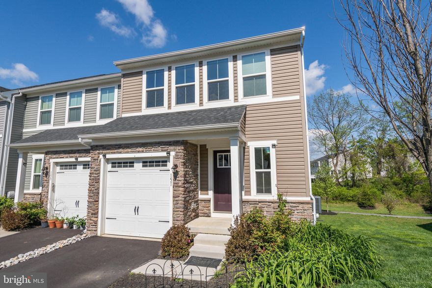 Beautiful, upgraded and spacious End-Unit townhome with fully finished Walk-out basement in the desirable Malvern Walk neighborhood. Premium lot with green views and privacy. Sun-drenched rooms with ample light and ventilation on all levels. Nine foot ceilings and all hardwood floors on the main level. Granite countertops and island in large kitchen w/tile backsplash, 42" cabinets and stainless steel appliances. Not to miss the large pantry. Spacious Living and Dining rooms w/adequate windows and recessed lighting. Large low maintenance deck made w/composite material. Easy to maintain hardwood stairs w/painted risers. Primary bedroom w/tray ceiling, walk-in closet, second closet and large primary bathroom. Convenient second floor laundry room. Two guest bedrooms and one additional bathroom complete the second floor. Delightful finished walk-out basement that can be used in a variety of ways. Sliders and windows ensure a lot of natural light throughout the day. Great Valley schools. Amazing connectivity to highways, shopping, parks, schools, work opportunities and more !! Schedule your tour soon !!