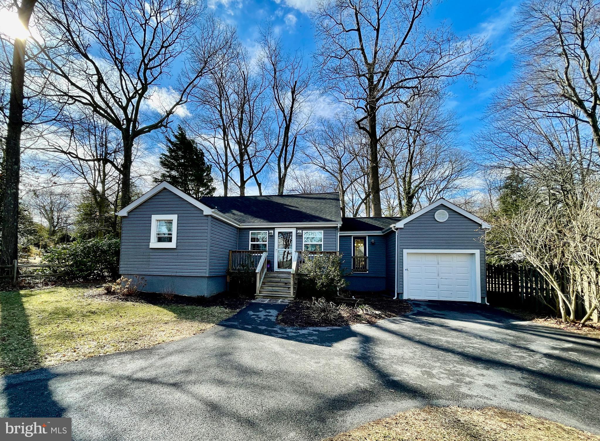 This beautifully renovated rancher with water views hosts a spacious yard, 1 car garage and is walking distance from the water! The entire home has been freshly re-painted. As you enter through the front door and you will notice the major modernization in this updated masterpiece that you can call home! This property features 3 bedrooms and 2 updated full baths. The kitchen is accompanied with stainless steel appliances, granite countertops, LVT flooring and updated cabinets! There are large built in storage areas in the attic as well as a platform above the garage. There is a community beach nearby, perfect for volleyball, cookouts, and community events!