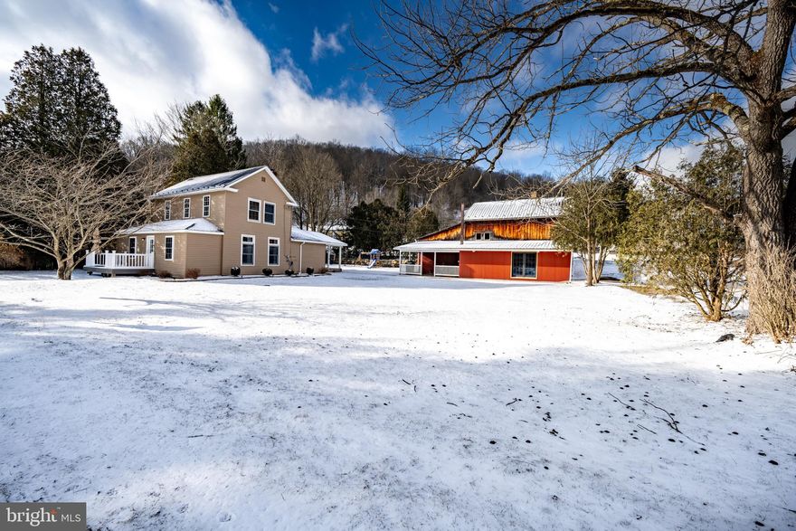 Welcome to 82 Railroad Street! This renovated farmhouse offers 4 bedrooms and 2 full baths across two levels. Set in a private, peaceful setting, this home blends classic charm with modern updates. The level lot provides usable outdoor space, while the barn with garage adds exceptional storage and versatility. Ideally located just 5 minutes from Interstate 68 and only 20 minutes to Deep Creek Lake. Perfect as a full-time residence or a second home retreat.