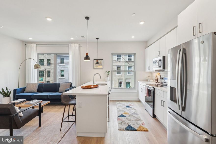 Welcome to Paradise Peak Townhomes – an exclusive collection of 24 new construction townhomes tucked-away near East Falls in the Paradise neighborhood. Come home to your brand new home with 3 spacious bedrooms and 2.5 stylish bathrooms, garage parking, green roof deck, and a thoughtfully crafted multi-floor layout that maximizes both space and functionality. Plus, enjoy incredible peace of mind with a 10-year tax abatement and a 1-year builder warranty included. 

Located just steps from the Schuylkill River and Fairmount Park, Paradise Peak puts you at the edge of nature without sacrificing convenience. Take a scenic 4-minute stroll to Laurel Hill Cemetery, where you can enjoy panoramic river views, or hop on your bike for an easy ride along the Schuylkill River Trail. When you're ready to refuel, grab a coffee and a mouthwatering ham-and-cheese croissant at Thunder Mug Café. And for dinner? Explore the vibrant culinary scene in East Falls with favorites like In Riva, Le Bus, and Fiorino—a hidden Italian gem that will steal your heart.

Step inside and discover a modern, versatile entry room that’s perfect for a cozy lounge or productive home office. The second floor unfolds into a spacious open-concept kitchen and living/dining area, ideal for entertaining guests or enjoying cozy nights in. The kitchen is a true chef’s dream, featuring a large island with seating and sleek stainless steel appliances, all bathed in natural light from expansive windows. A convenient half bath rounds out the space. 

The third floor is dedicated to relaxation with a luxurious primary bedroom complete with a walk-in closet and a private en-suite bathroom. A hallway closet with side-by-side washer and dryer adds to the convenience. The fourth floor boasts two additional bedrooms, perfect for family or guests, plus a full bath. Finally, head up to the roof deck, an outdoor oasis with a combination of commercial-grade TPO and a Green Roof—an eco-friendly touch that improves air quality and insulation while giving you a serene space to unwind and take in the city skyline.

With easy access to Center City, Route 1, and I-76, Paradise Peak offers the perfect balance of modern amenities and serene surroundings. Don’t miss your chance to make one of these stunning townhomes yours—paradise is waiting!
 **These properties qualify as PUDs. An HOA fee of $75.00/mo will be due after the 12th property is sold. currently 5 properties are scheduled to close before the end of May 2025.