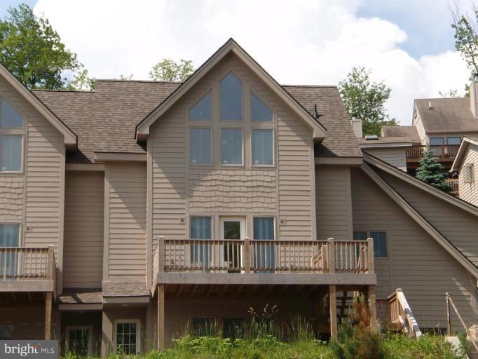 Three level condo with great lake views. Three bedrooms, 3 and 1/2 baths. Ready for your finish choices. Outstanding lake location - walk to restaurants, coffee shop, and rental boatslip. Special developer offer - includes $10K Furniture Package and first year dock rental (ask for details). More info in MRIS Docs.
