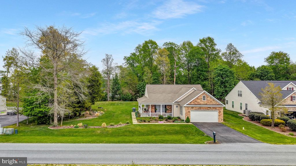 Photo of 30462 Oak Ridge Drive, MILLSBORO, DE 19966 (MLS # DESU2109918)