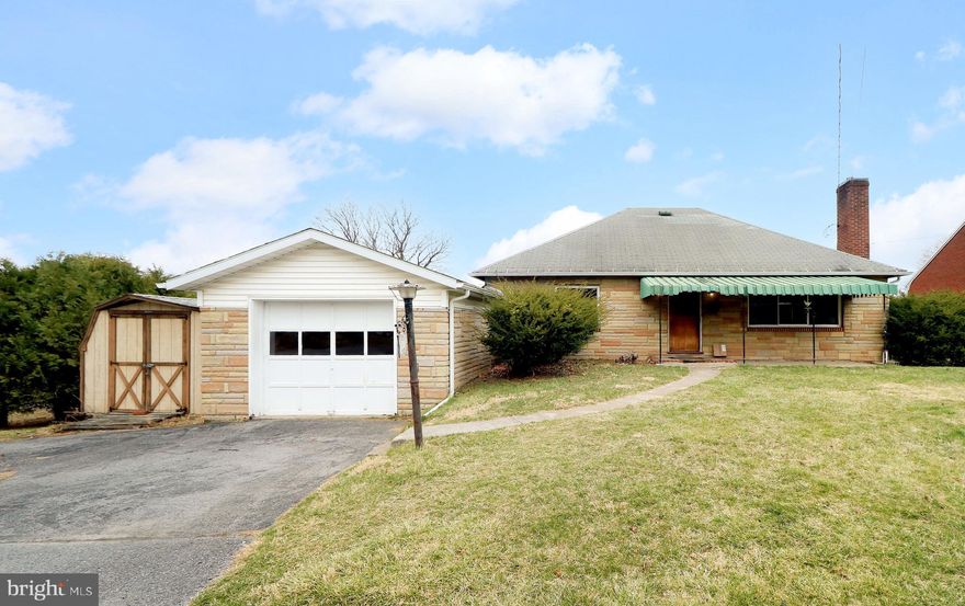 This cozy 2-bedroom, 1-bath ranch with an additional office is a perfect mix of comfort and convenience. The home features stone siding and beautiful hardwood floors in the bedrooms and hallway. The bathroom has been updated, and there’s plenty of storage with a walk-up attic, a one-car garage, and a shed.
Stay comfortable year-round with central air, natural gas heat and a wood burning fireplace. Out back, enjoy a brand-new composite deck overlooking a flat, fenced-in yard—great for relaxing or entertaining. Simple, cozy, and well-maintained, this home is ready for you to move in!