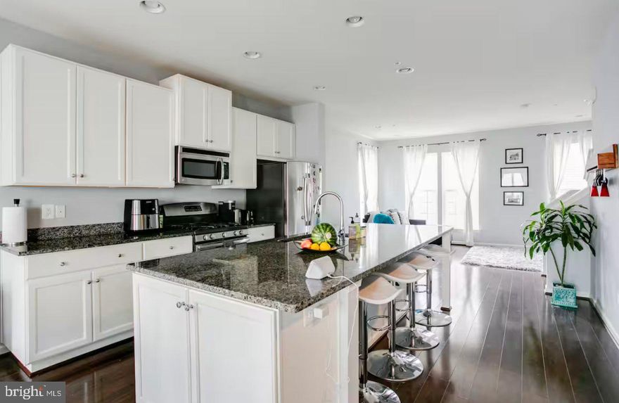 Don't miss stunning, bright 3 bedroom 2.5 Bath Townhouse with a garage and garage port, located in the Gallery Park community of Clarksburg. This home offers an open floor-plan with over 2200 SQ FT of living space. Huge open floor plan on main level  with living room, an eat-in kitchen with a huge center island, granite counter tops and stainless steel appliances. The third level features 1 master bedroom with master bathroom and a walk in closet,  2nd specious bedroom and 2nd bathroom.   On the fourth level, you will find an amazing  bedroom loft with a walk-in closet. This home is ideally located within a community that offers walking trails, tot-lots and is a moment's drive to shops, restaurants, The Clarksburg Premium Outlets and I-270. With all this home has to offer, this is one you will not want to miss!