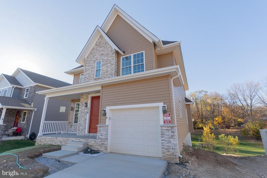 If closing occurs by May 31, 2024 the Seller will contribute up to $10,000.00 towards the Buyer's closing costs and give a $3000.00 credit for - a frameless glass shower door, one year of super fast high speed internet up to 800 MBPS, two year subscription of 24/7 professional complete protection Simplisafe home monitoring.

Welcome to this exceptional custom new construction house that is now available for sale. This stunning home offers a blend of luxury, functionality, and unique touches throughout, providing an unparalleled living experience. Upon entering, you will be greeted by 9ft ceilings that create a spacious and airy atmosphere. Every room in the house is adorned with unique touches, showcasing the attention to detail and craftsmanship that went into its design. Featuring 4 bedrooms and 2.5 bathrooms, this house is perfect for families or those in need of additional space for a home office or guest rooms. The master bath is a true oasis, boasting a luxurious rain shower and a freestanding tub, allowing you to unwind and indulge in a spa-like experience. The kitchen is a chef's dream, with highly upgraded features that will surely inspire your culinary adventures. Custom counter outlets and a gesture-activated sink and over sink light add convenience and modern functionality. The premium stainless steel appliances, including a farm sink, elevate both the aesthetics and functionality of the kitchen. Step outside onto the 12x12 deck, where you can relax and entertain guests in style. The high roof lines add architectural interest and enhance the overall appeal of the house. For your peace of mind, the house is equipped with an integrated Simply Safe home security system, ensuring the safety and security of your loved ones. During colder months, cozy up to the thermostat remote-controlled gas fireplace, which boasts a custom black walnut mantle, adding warmth and ambiance to the living space. The one-car garage provides secure parking and storage space, complete with a WIFI-controlled Lift-master door opener for added convenience. The front door is equipped with video monitoring, enhancing the security of the property. For electric vehicle owners, the built-in EV charger in the garage allows for easy and convenient charging. The exterior of the house features a beautiful stone front and a slate porch, adding charm and curb appeal. The carefully curated outside lighting package further enhances the overall aesthetic, creating a welcoming and inviting atmosphere. This custom new construction house offers a perfect blend of luxury, functionality, and modern amenities. Don't miss the opportunity to make this exceptional property your new home.