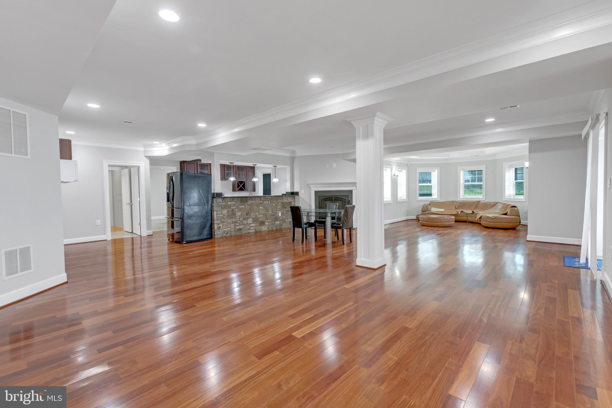Spacious 3-Bedroom Private Apartment in Luxury McLean Estate Located in a prestigious McLean neighborhood, this beautifully finished 3-bedroom, 2-bath apartment offers upscale living with exceptional privacy. Situated on the lower level of a custom estate home, this unit features its own private entrance—ideal for those seeking comfort and convenience in a serene setting. Inside, you’ll find a full-sized kitchen with ample cabinet and counter space, a large open-concept living and dining area, and a cozy fireplace—perfect for relaxing or entertaining. Enjoy hardwood floors throughout, an in-unit washer and dryer, and your own dedicated home theater room for the ultimate movie nights. All three bedrooms are generously sized with excellent closet space. Option to rent partially furnished is available. Tucked away on a quiet, tree-lined street with easy access to major commuter routes, shopping, dining, and top-rated Fairfax County schools, this unique rental offers a rare opportunity to enjoy luxury living in one of Northern Virginia’s most sought-after communities. Schedule your private showing today!