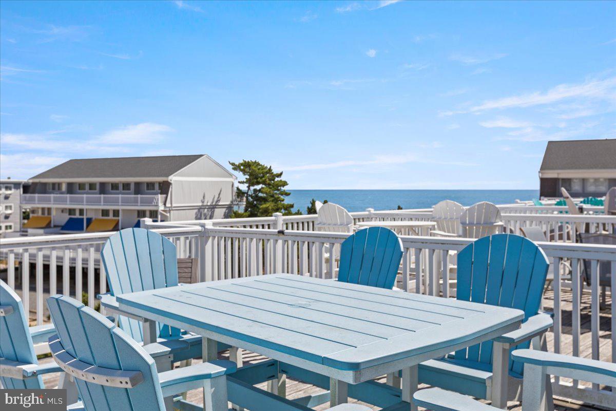 Welcome to Beachwalk - the perfect beach escape in the heart of midtown Ocean City. You won't want to miss out on this unit while it's available, as these properties don't come around often! With close proximity to dining, restaurants, entertainment and, most importantly, steps from the beach, location matters and this one checks every box. This unit went through a complete renovation in 2020, with further improvements made every year since including a new HVAC unit installed last year. Walk in to find an entry level bedroom, full bath, full-sized laundry and access to the back porch, leading out to the community pool and common area. Upstairs, you'll find the main living space, with an updated kitchen with stainless appliances, a half bath for convenience, an amazing dining area to fit all friends and family, in addition to a comfortable living room equipped with a queen-size sleeper sofa that leads out to a large balcony to enjoy meals and look out over the dunes. Upstairs you'll find two more bedrooms, including a master with a private balcony, a full bathroom and a bunk room with two twin over full bunks. The top level contains another bunk room with another twin and queen-size bed, another full bath and access to the rooftop deck with picturesque views of the ocean. The unit has been meticulously maintained by the current owners, who have put a lot of work in to making the place perfect and ready for the next owner. Fully furnished and ready to go - all you need are your beach chairs and your new beach retreat is waiting for you! The condo association is in great standing, with no upcoming special assessments and plenty in reserves to make updates to the grounds. Recent projects include rooftop deck update (2018), new A-Frame roofs (2021), in addition to the already completed composite decking on the two balconies and the upcoming replacement of the board walk this coming year. With a large outdoor pool, a private outdoor shower and storage locker, in addition to private parking, community picnic area and dog park, you'll have everything you need here at Beachwalk! For investors, this has been a lucrative vacation rental grossing over $100k in previous years. Make your appointment today before it's gone tomorrow! Virtual walkthrough coming soon!