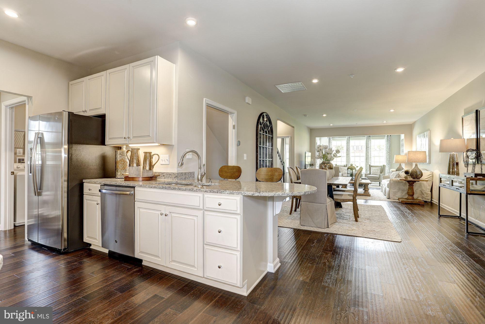 This home is to be built . The Calvert Basement is located in the Woodlands, Urbana's only EXCLUSIVE 55+ active adult community! Our bestselling villa floorplan offers the key conveniences you're looking for--the Primary suite and laundry room are all on the first floor. This home includes LVP on the first floor, upgraded Tahoe painted ember cabinets, luxury owners suite and so much more !The Calvert is the perfect, right sized home and has 2,500 sq. ft. of finished living space. Its open design, generous bedroom sizes, and a luxurious owner's bath make it a favorite! The Woodlands Community is located in southern Frederick County and is only minutes away from Urbana's vibrant market district, downtown Frederick, and I-270/Montgomery County. The community will feature tons of amenities to include pool/clubhouse, fitness center, putting green, pickleball/bocceball courts, trails, and much more. And another perk-- enjoy never having to mow your grass or shovel snow again! Photos are representative only.