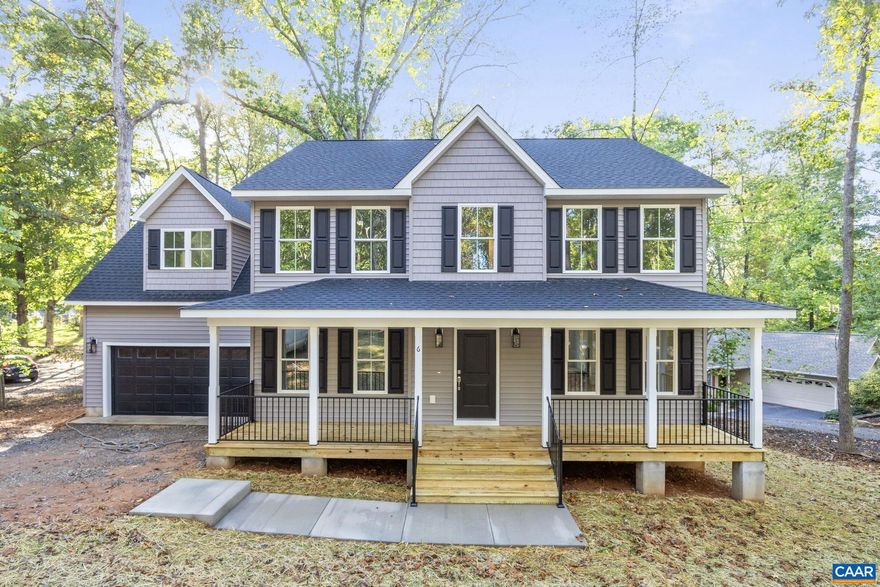 Seller is offering $10,000 towards closing cost w/ acceptable offer closing before 12/30/25. Brand NEW home by DES Construction! Come sit on your covered front porch and relax at this almost 2600 finished sq feet. This home features tons of natural light especially when you enter into the 2 story foyer. Main level there is luxury vinyl plank throughout. Traditional colonial design w/ home office, formal dining room, family room w/ gas fireplace. The kitchen has white cabinets, granite countertops, subway backsplash, SS appliances, and large pantry. Next to the garage door and kitchen are built in cubbies. Upstairs you will find a large master bedroom with luxury LVP, huge walk-in closet, bathroom w/ 5' tile shower w/glass door and double vanities with granite countertops. 2 additional bedrooms, full bath with double vanities, and bonus room with closet that could be used as 4th bedroom. Large laundry room close to the bedrooms upstairs.  12x16 rear deck & 2 car garage. Dual zone heat pumps and conditioned crawl space. Come enjoy all of the amenities of living at the gated community of Lake Monticello. Amenities include golf course, 5 beaches, pool, multiple tennis courts, playgrounds and basketball courts, marina and fishing pond.,Granite Counter,White Cabinets,Fireplace in Family Room