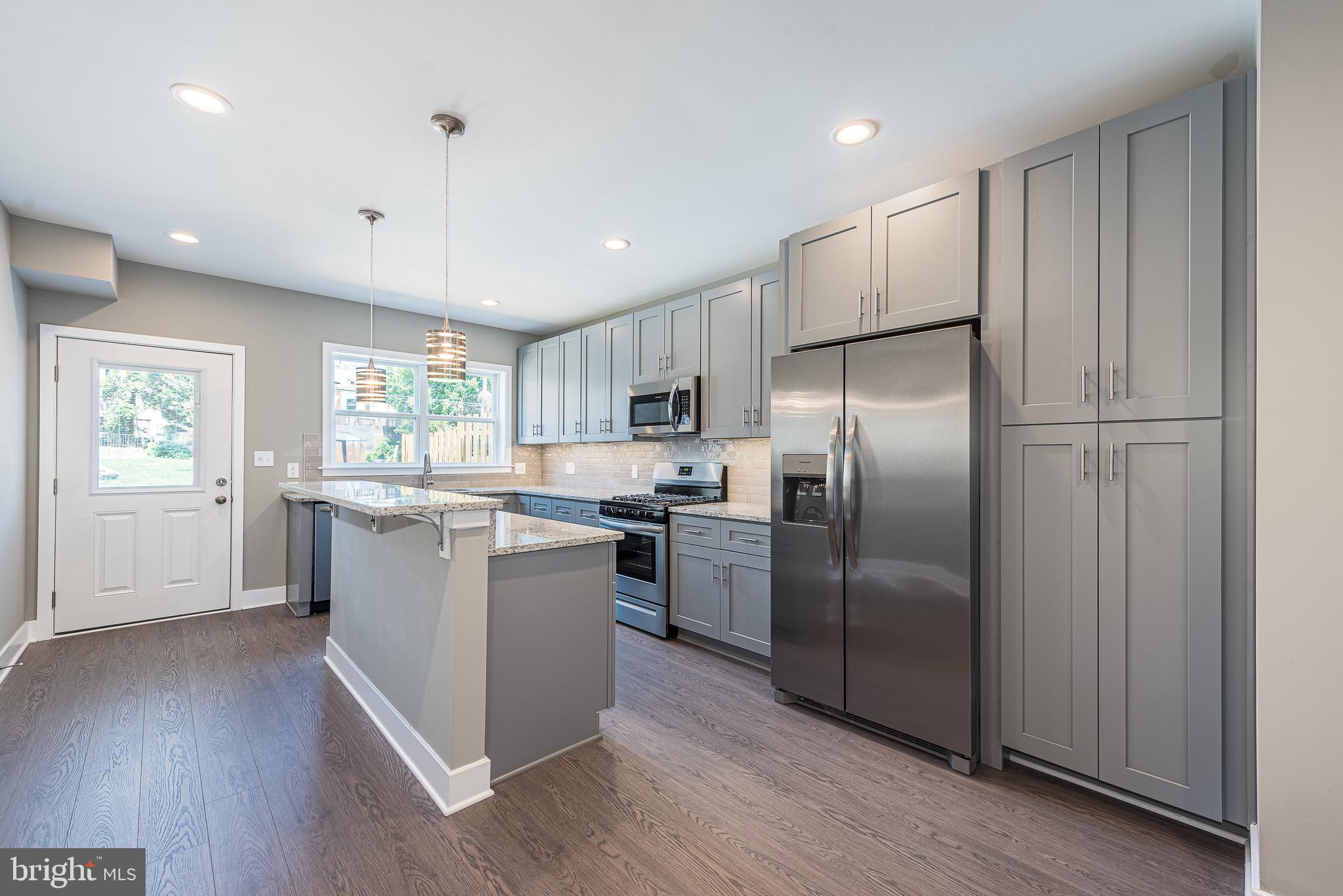 AVAILABLE FOR IMMEDIATE DELIVERY! INTRODUCING UPTON GATEWAY - MAKE HOME OWNERSHIP A REALITY! LUXURY RENOVATIONS WITH TONS OF BUYING INCENTIVES THAT MAKE OWNING A HOME MORE AFFORDABLE THAN RENTING! Standard features include 3 finished levels, wood floors throughout the main level and hallways, carpet in bedrooms, kitchens with 42" cabinets, Frigidaire ss appliance package, and granite counters. Main level with an open floor plan featuring a spacious living room, separate dining area, an island kitchen, & a main level half bath, upper level Primary bedroom suite with full bath and walk-in closet and a 2nd bedroom with a hall bath and bedroom level laundry, 3rd level with 3rd bedroom, 3rd full bath, and a family room, and off street parking! Tons of buying incentives including 10K Vacants to Values grant, 25K Live Near You Worship Grant, and a $2,500 lender credit when you use the preferred lender! Pictures are of a finished home in Upton Gateway but this property is completed with new pictures coming soon