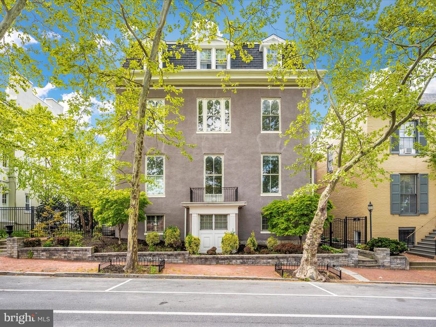 Eleven-foot-tall ceilings and large windows bathe the home in light.  The detailed extra wide molding and trim, decorative fireplace and antique hardwood floors create a special feel that is complimented by the updated kitchen with granite countertops, newer cabinets and modern appliances.  There is a washer and dryer in the unit as well.  For extra storage space there is an outdoor shed. Plenty of parking in the building's parking lot. Adjacent to City Park & Arts & Entertainment District and only 3 blocks to UMD.