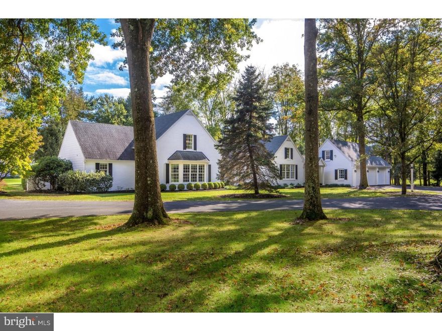 SALE PENDING  On a private road, in a world-class neighborhood, surrounded by mature trees and manicured lawns, this gracious home is set on 1.6 acres. To the west, a panoramic view of the 9th, 10th, and 11th fairways ? and to the south, the 12th tee and 18th green of the Weyhill Golf Course of the Saucon Valley Country Club. Walls of windows, in every room, frame the panoramic and protected vistas, provided by 850 acres of meticulously-tended club grounds. Part of a lovely four home enclave that is reminiscent of a New England village green, the design is so clever that, from all but one window, no other house can be seen. Renovated to demanding standards, there is a wonderful flow for entertaining in the open first floor spaces, enveloped by wraparound stone terraces with south-facing and westerly views of sunsets over the greens. A designer kitchen boasts a Wolf range, two dishwashers, wine cooler, beautiful granite counters, and fabulous cabinetry. A custom bar is central to the living room, dining room, family room, and kitchen and is equally beautiful in design and execution. The first floor master suite has a sumptuous closet that wraps around the marble master bath and laundry. Two bedrooms, two baths, and an additional family room are on the second floor. Here, worry-free luxurious living has been elevated to a higher degree in a location that rarely becomes available, on a private road where daily walks will be a reward at day's end.